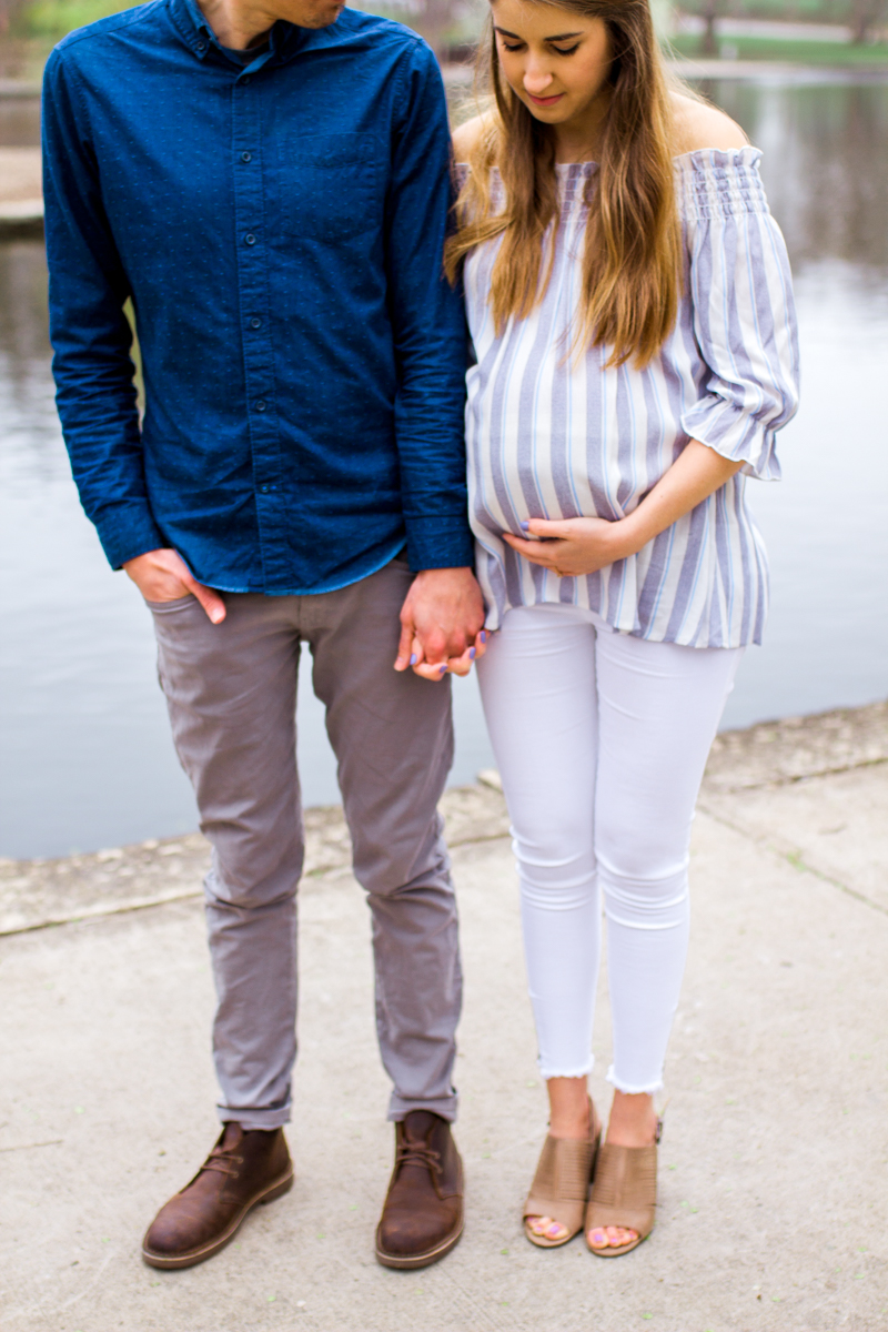  Kansas City Loose Park spring maternity session walking by the pond holding hands Kansas City maternity photographer 