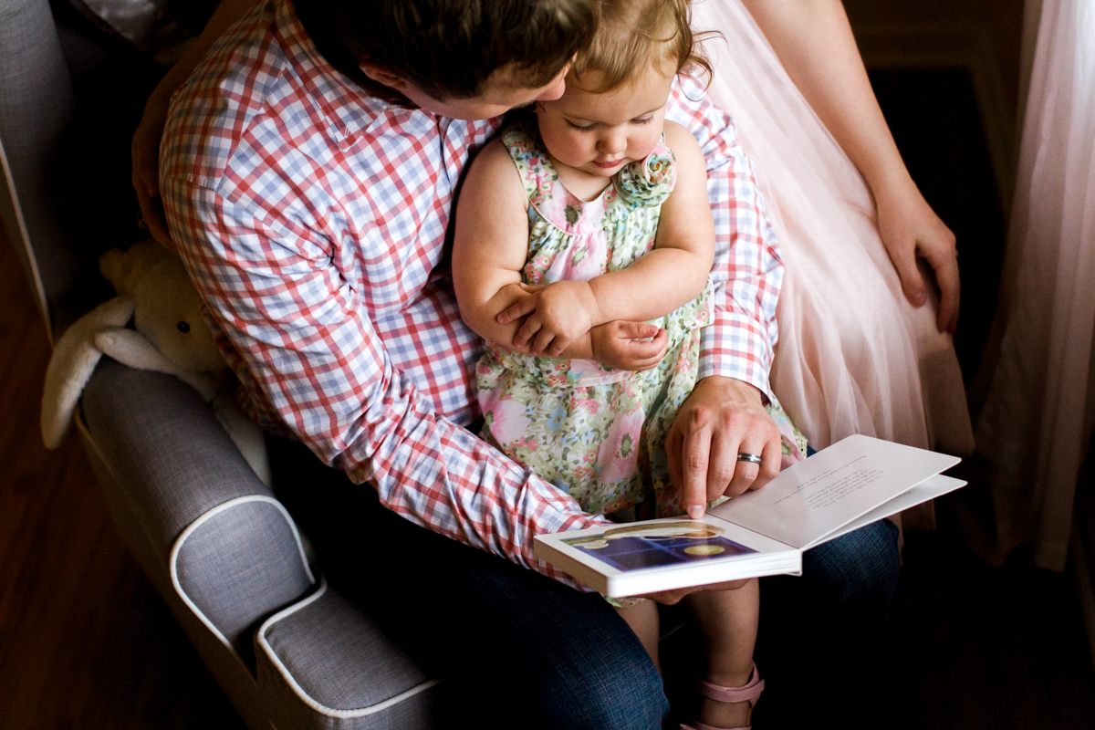 Kansas City Family photographer, in-home lifestyle family photography family reading together Rebecca Clair Photography
