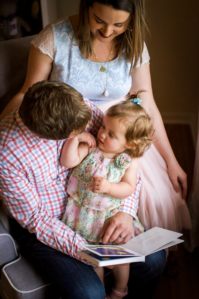  Kansas City Family photographer, in-home lifestyle family photography family reading together Rebecca Clair Photography 