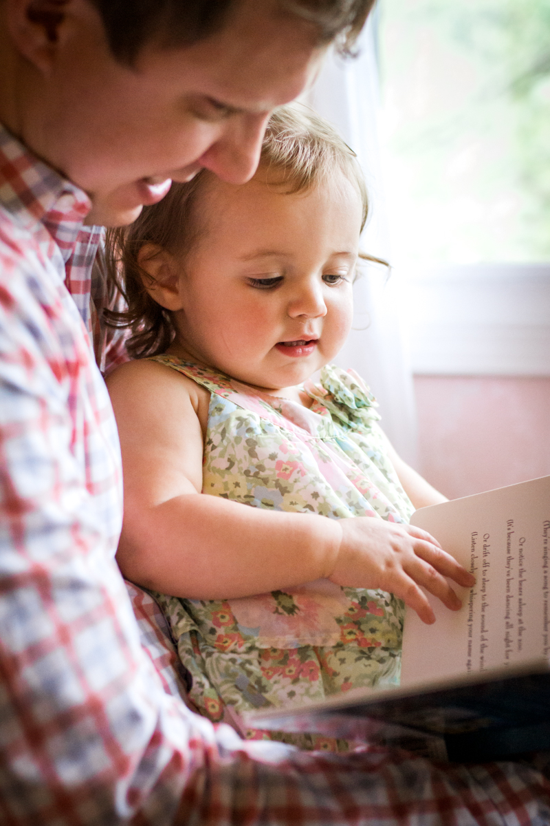  Kansas City Family photographer, in-home lifestyle family photography father and daughter reading together Rebecca Clair Photography 