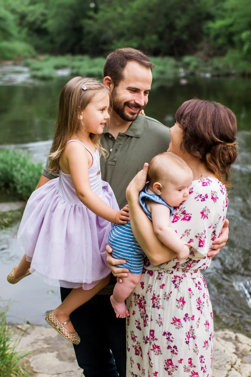 Rebecca Clair Photography Kansas City MO lifestyle family photographer Line Creek Trail Family Session family together by a waterfall
