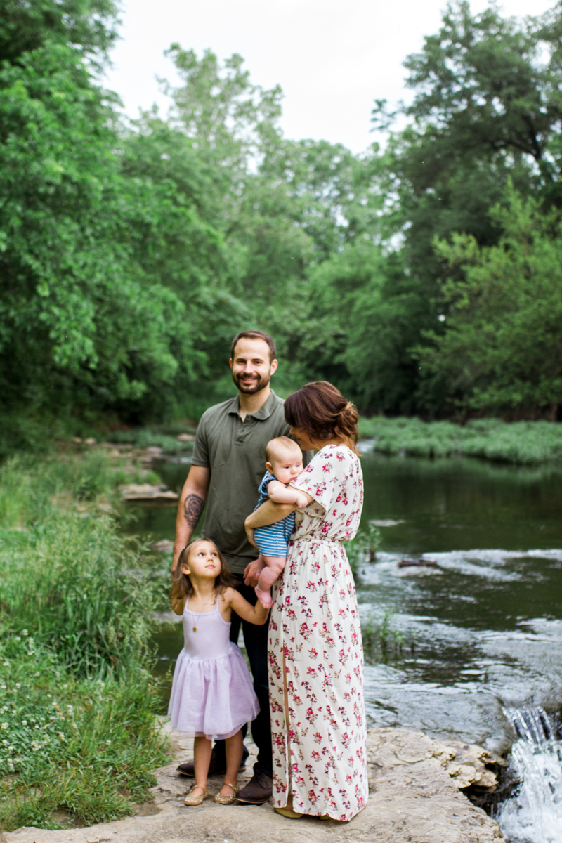  Rebecca Clair Photography Kansas City MO lifestyle family photographer Line Creek Trail Family Session family together by a waterfall 