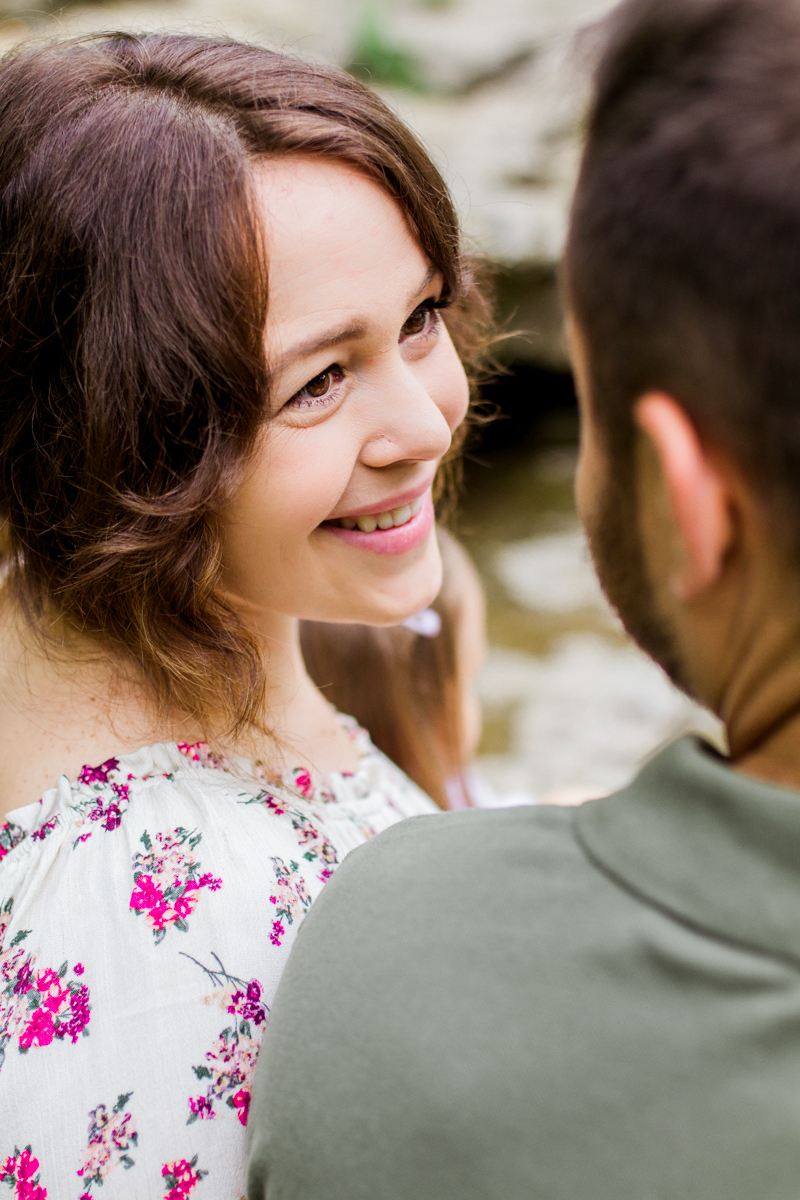  Rebecca Clair Photography Kansas City MO lifestyle family photographer Line Creek Trail Family Session wife smiling up at her husband couples photography 