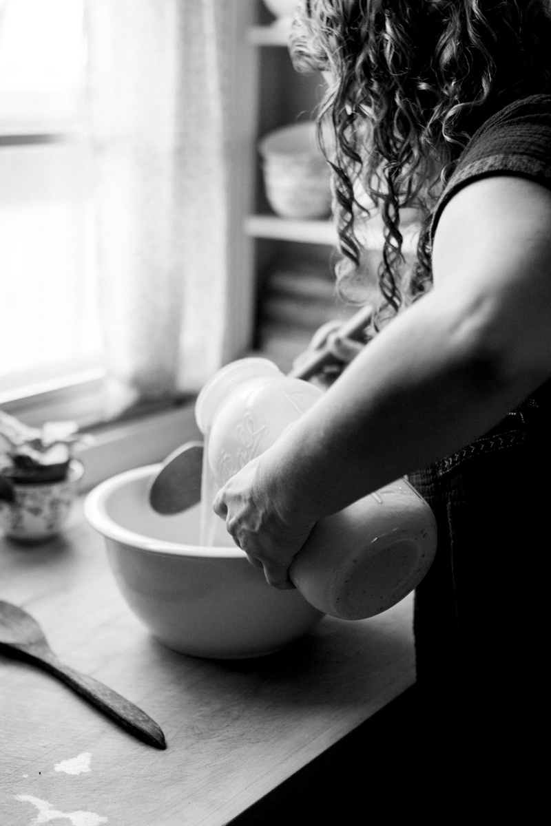  Kansas City small business lifestyle photography seven swans creperie woman making crepes black and white photo 
