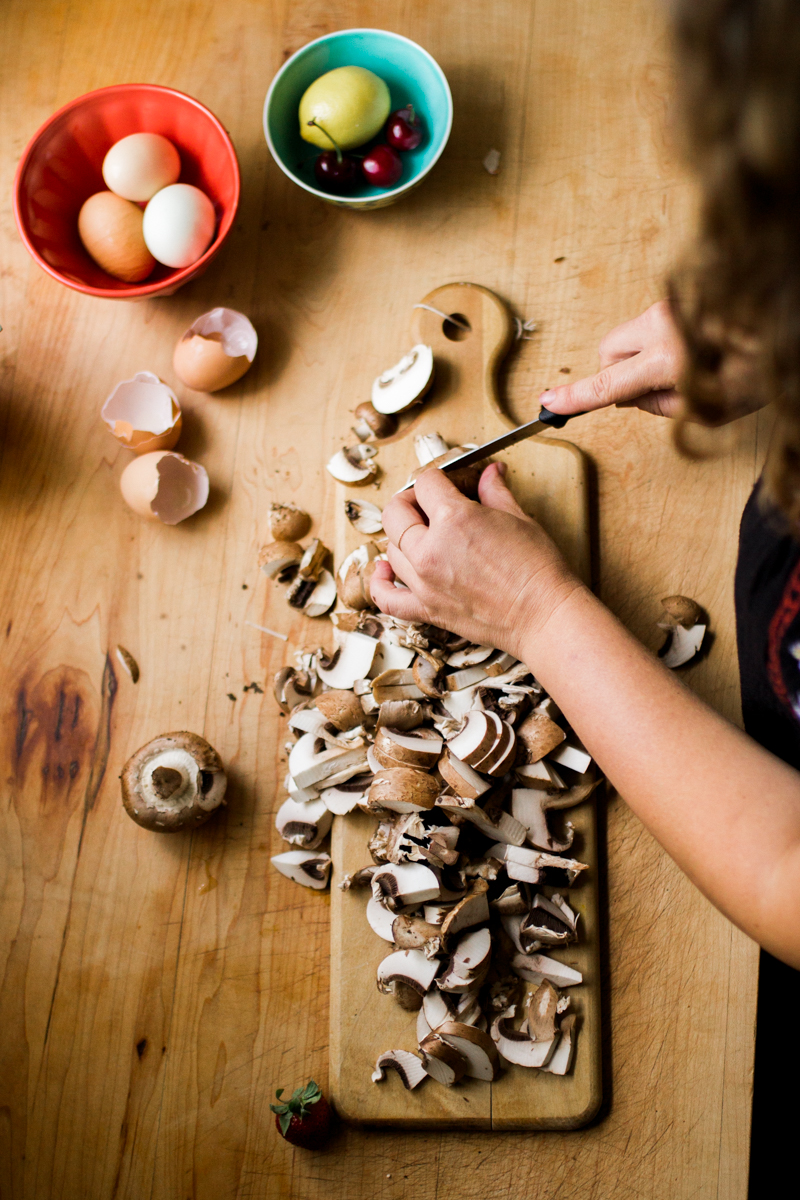  Kansas City small business lifestyle photography seven swans creperie woman slicing mushrooms 