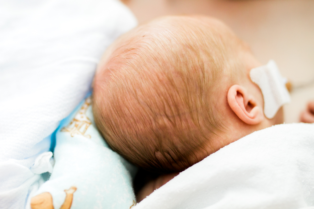  Rebecca Clair Photography lifestyle NICU newborn photography Children's Mercy Hospital newborn baby ears 