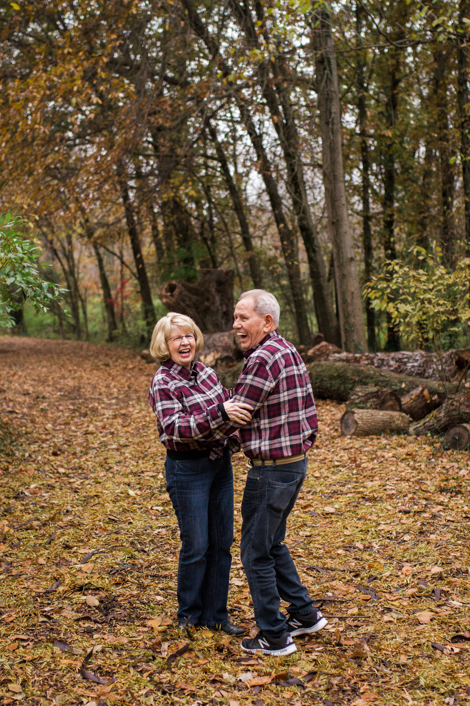  Kansas City lifestyle photographer, Kansas City family photographer, extended family session, fall family photos in the woods, older couple dancing, grandparents portrait 