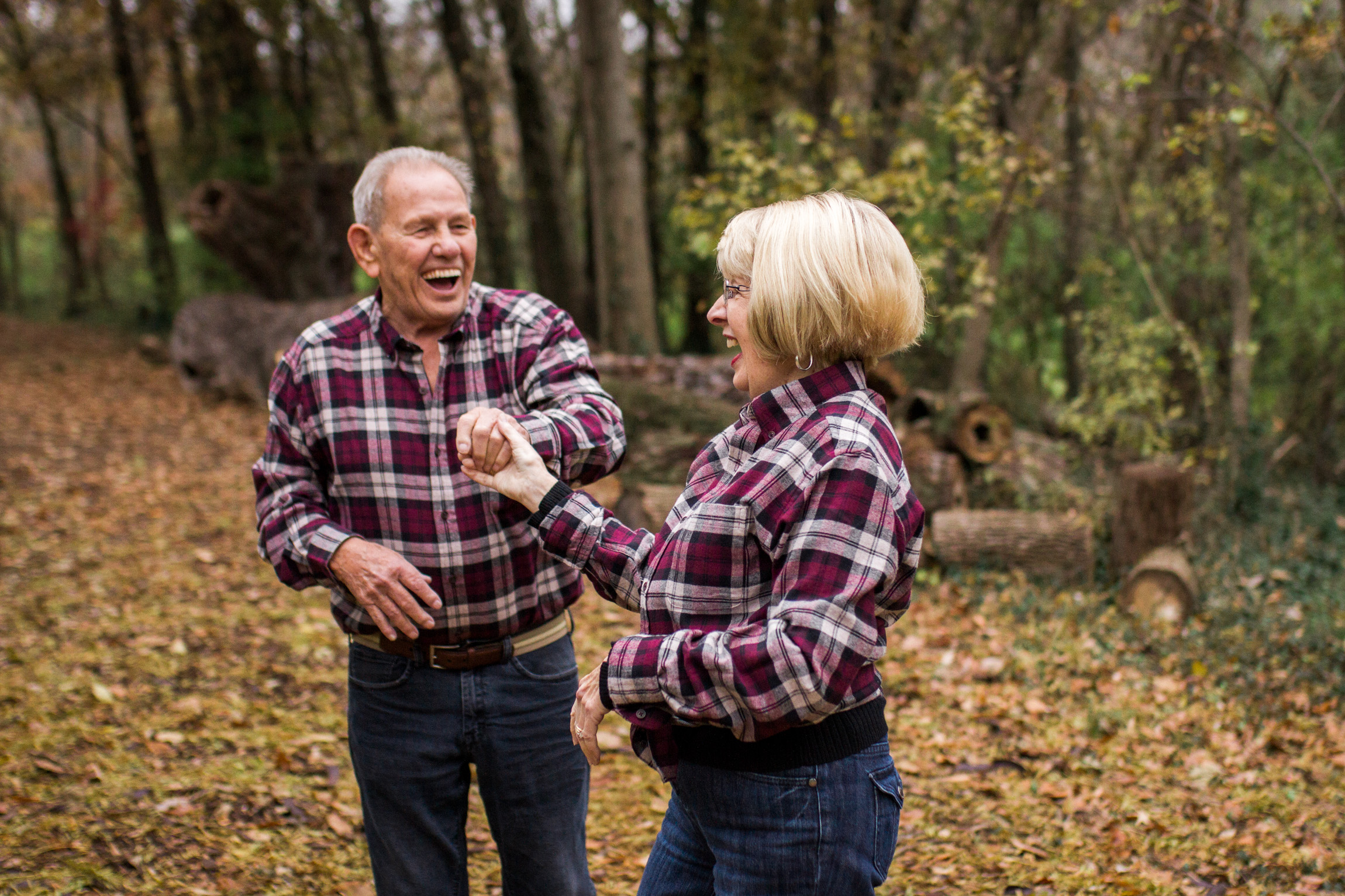  Kansas City lifestyle photographer, Kansas City family photographer, extended family session, fall family photos in the woods, older couple dancing, grandparents portrait 