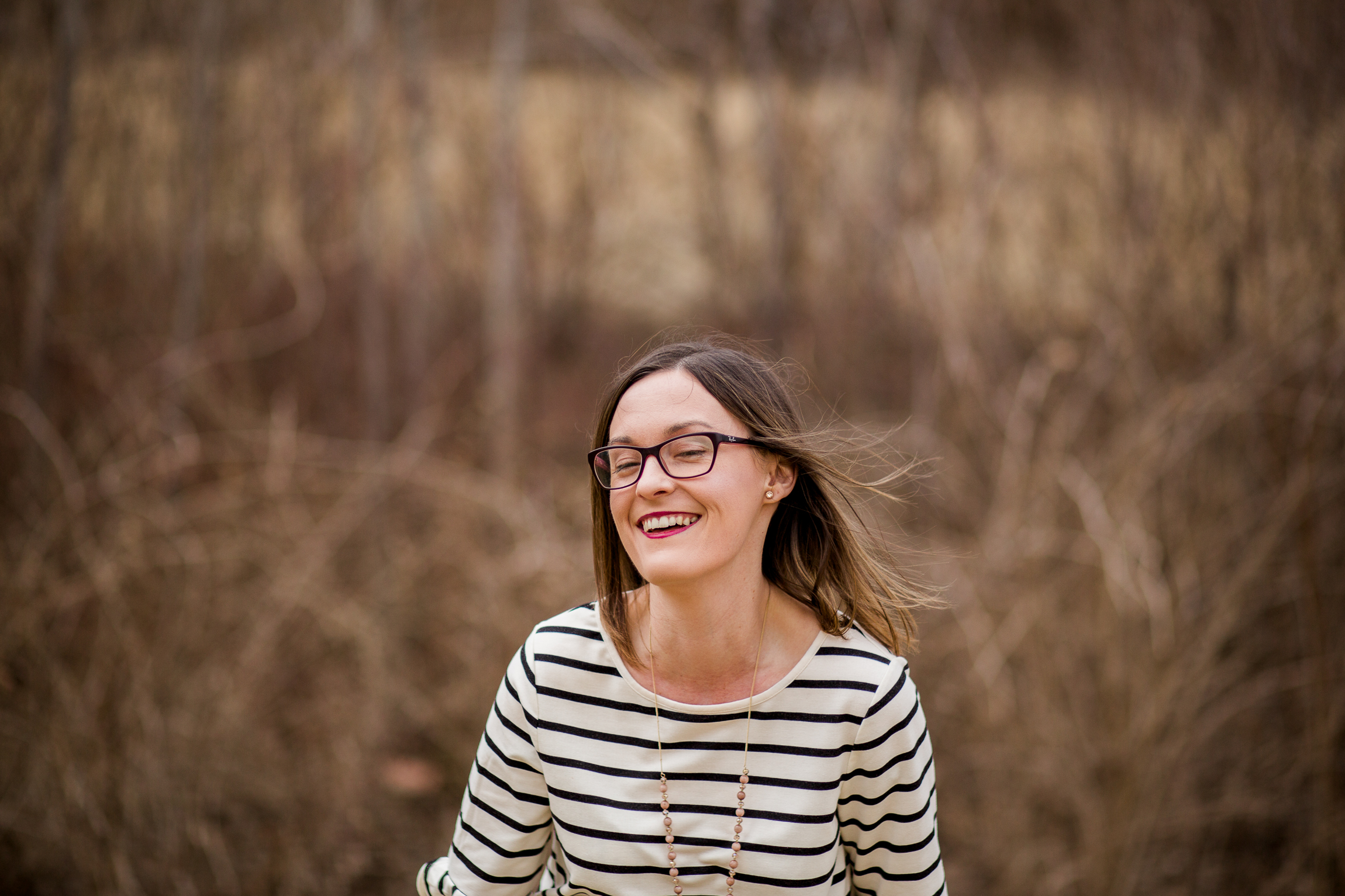  Candid portrait of woman laughing, Kansas City lifestyle photographer, Kansas City senior photographer, Kansas City small business headshots, Kansas City lifestyle blogger, candid portrait, winter portrait session, Penn Valley Park 