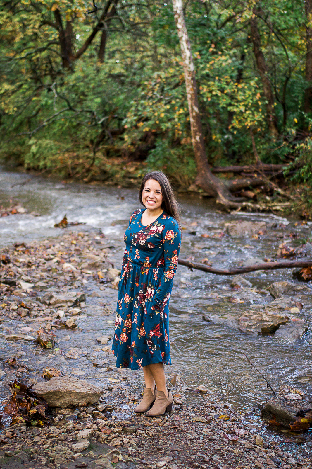  Woman stands at the edge of the stream, fall family photos, Kansas City lifestyle head shots and branding session, Rebecca Clair Photography 
