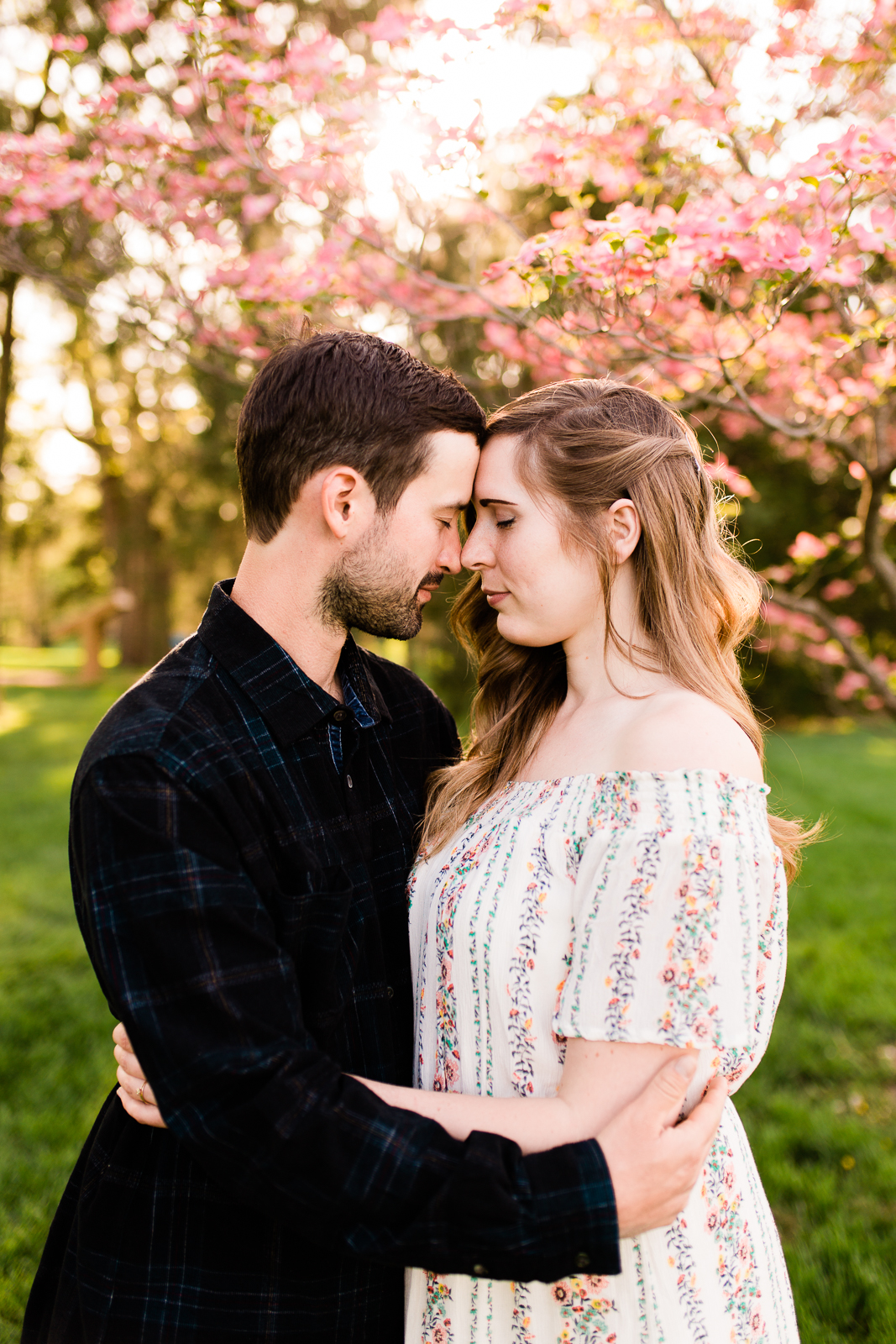  Couple touching foreheads, married couple under flowering trees, Kansas City couples photographer, Rebecca Clair Photography 