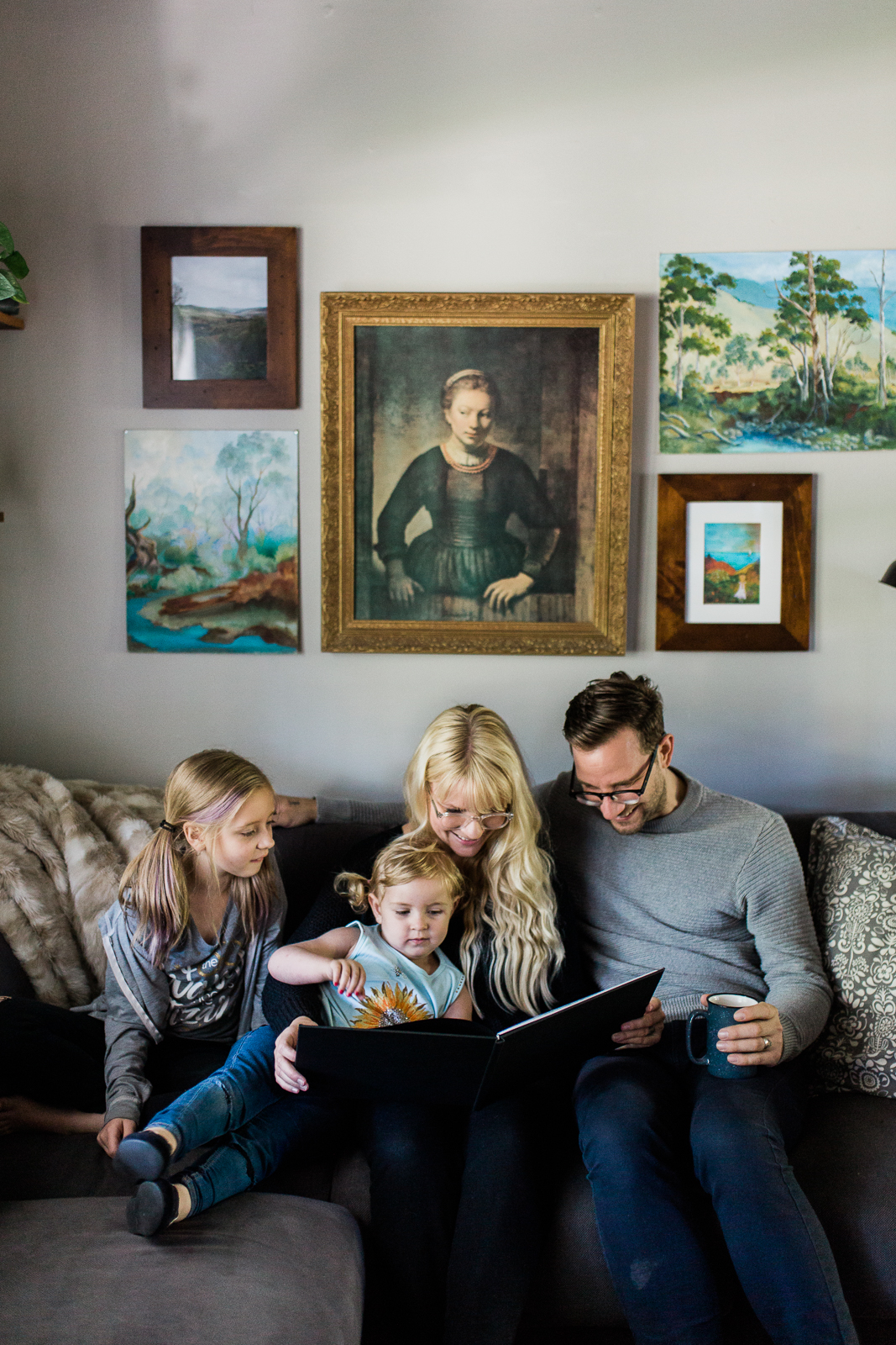 Rebecca-Clair-Photography-Kansas-City-family-photographer-enjoying-heirloom-print-products{Image # (1)»}-10.jpg