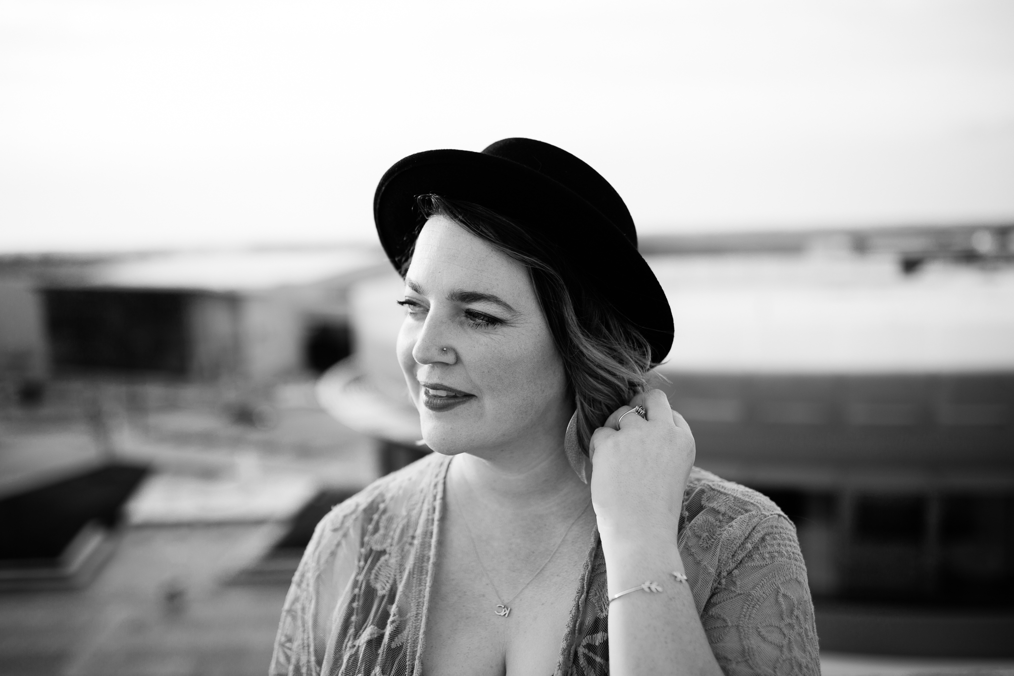 Black and white portrait of woman on a rooftop, Kansas City black and white headshot, Rebecca Clair Photography
