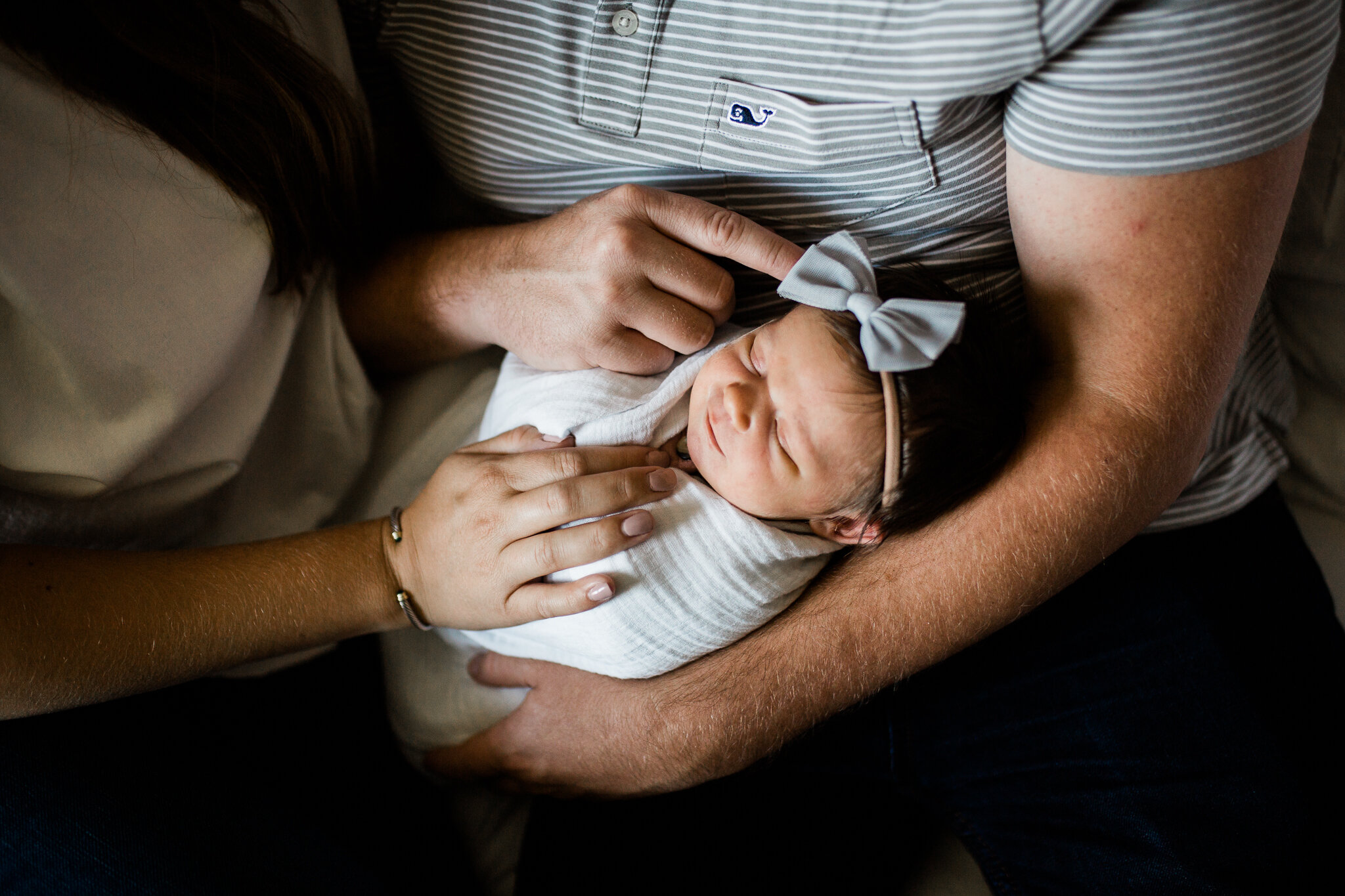  Close up portrait of parents touching their newborn's face, Kansas City newborn photographer, Rebecca Clair Photography 
