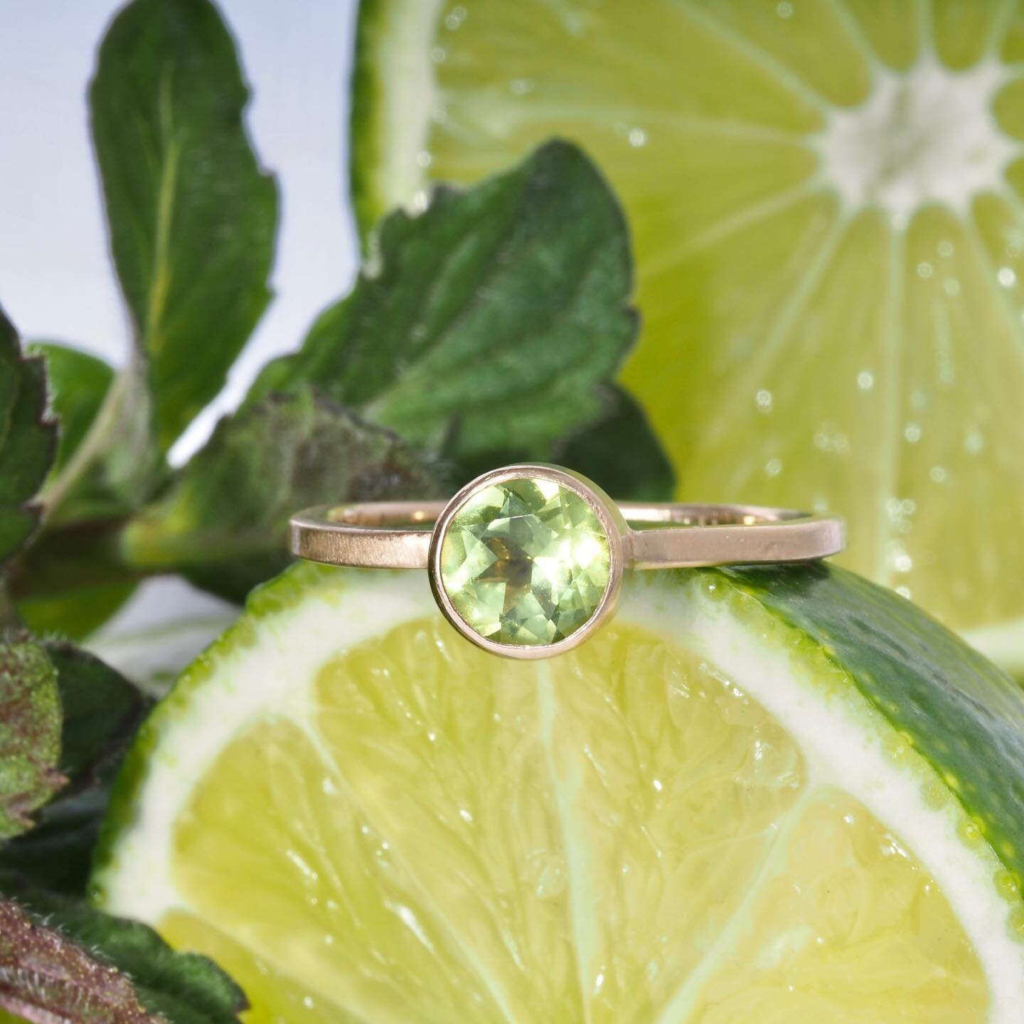 Peridot Mojito Ring - set in a matte-finished 14k recycled gold band. Size 7 in stock, but can be made in any size. This ring is perfect for stacking, but also great on its own for minimalist appeal. It&rsquo;s on our website under New Arrivals. #mad