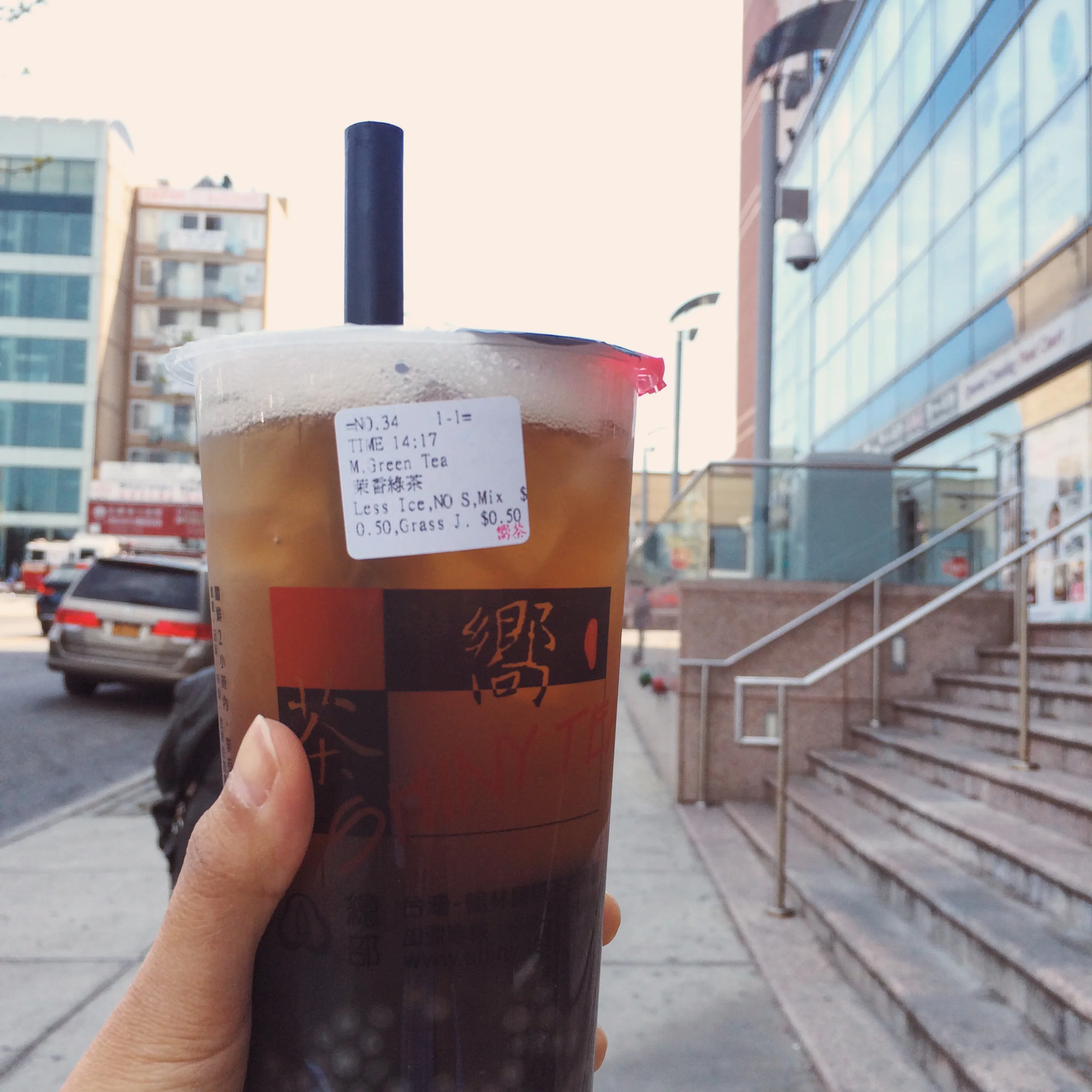 Osmanthus green tea with herbal (grass) jelly and mixed bubbles
