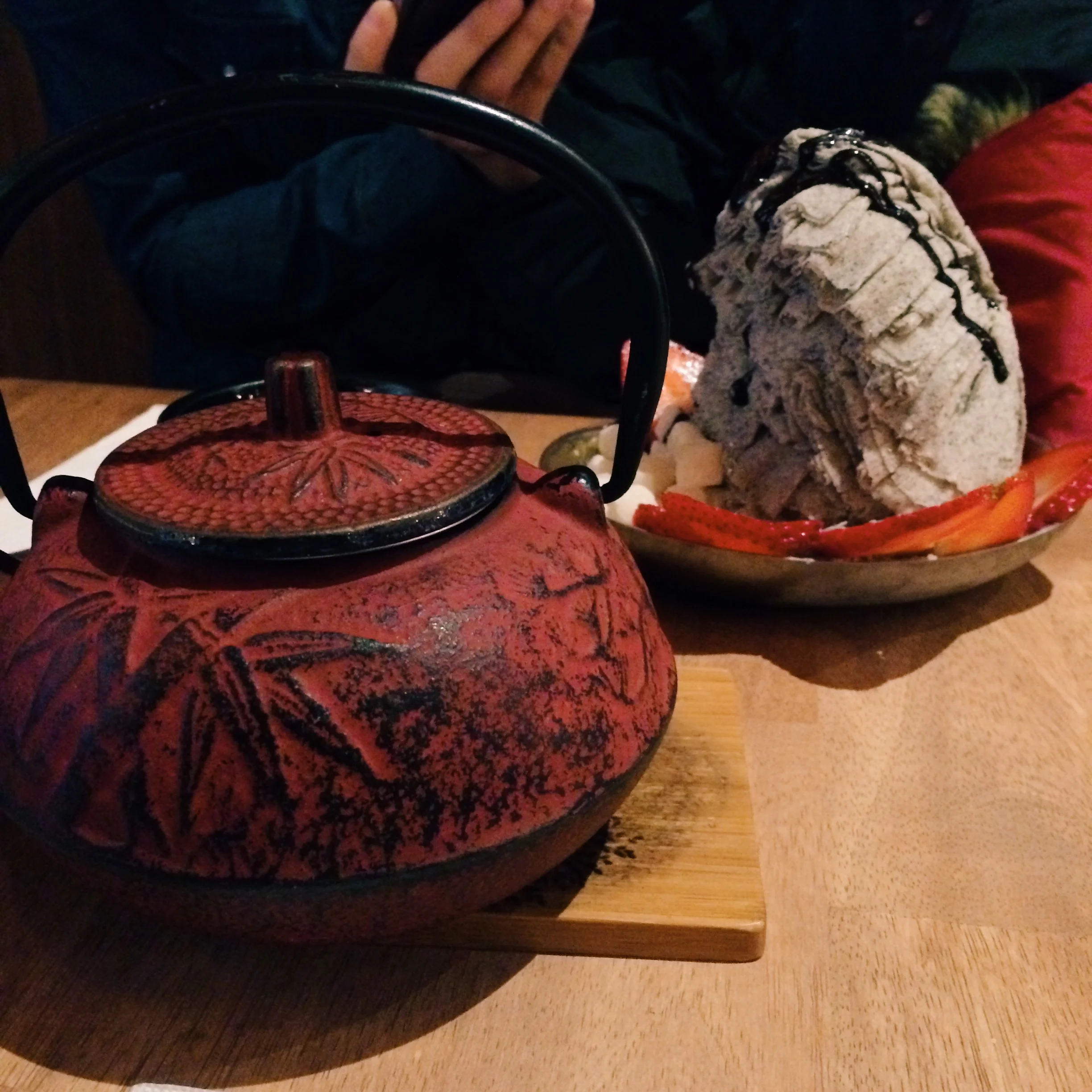 L: Jasmine Green tea, R: Black Sesame Shaved Snow w/ mochi, strawberries, and dark chocolate drizzle