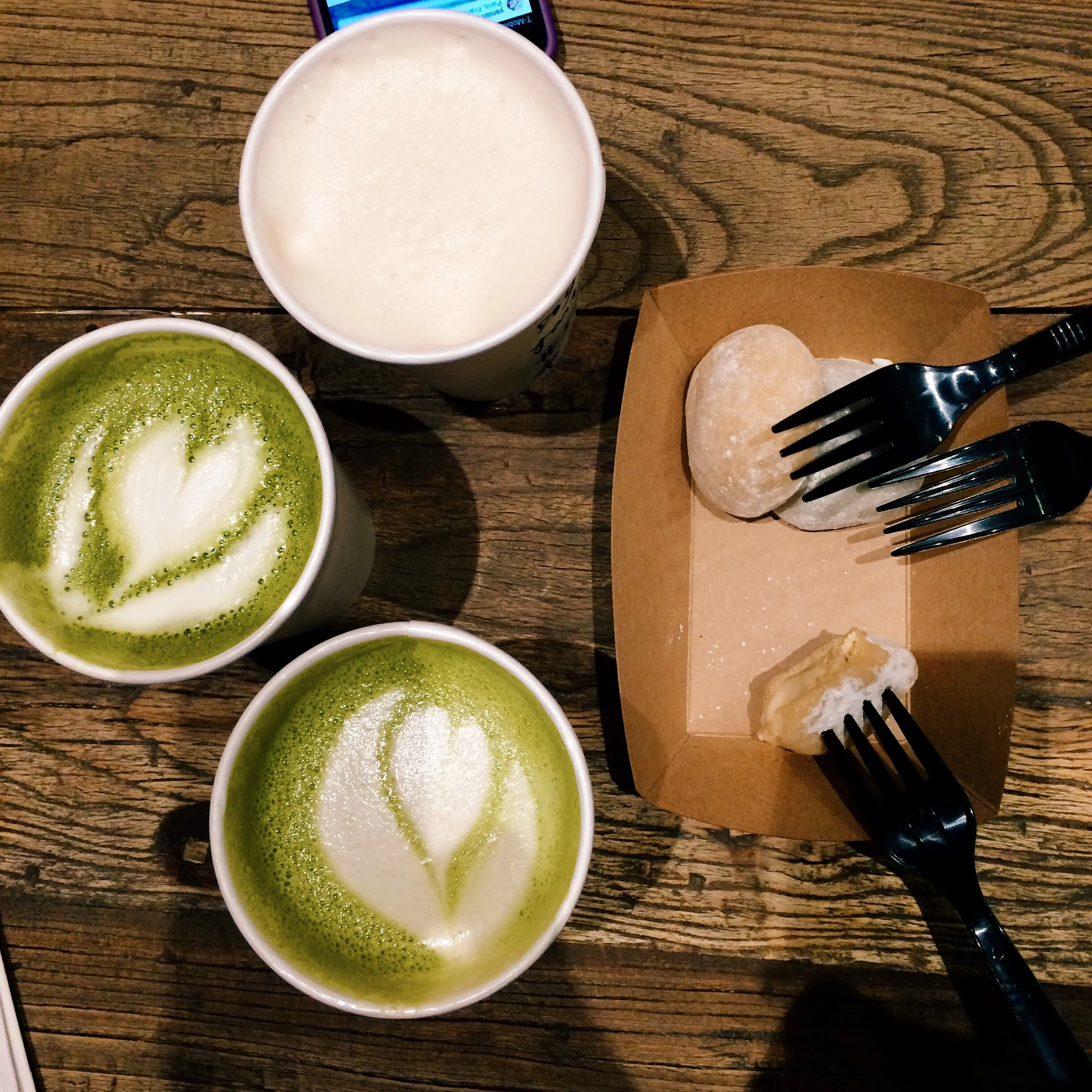 Top to bottom: Jasmine milk tea, honey matcha latte, soy jasmine matcha latte + ice cream mochi