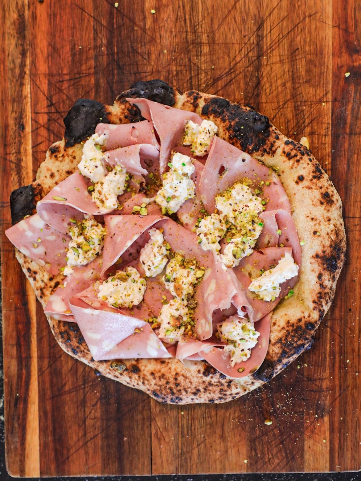 Three pizzas. One Char Club Saturday. Swipe to see what came out of the oven this week. Margherita, Mortadella Burrata Pistachio, and a Marinara with shaved garlic. Subscribe for Saturday drops. Link in bio. #pizzadrop #sourdoughpizza #lafoodie #thec