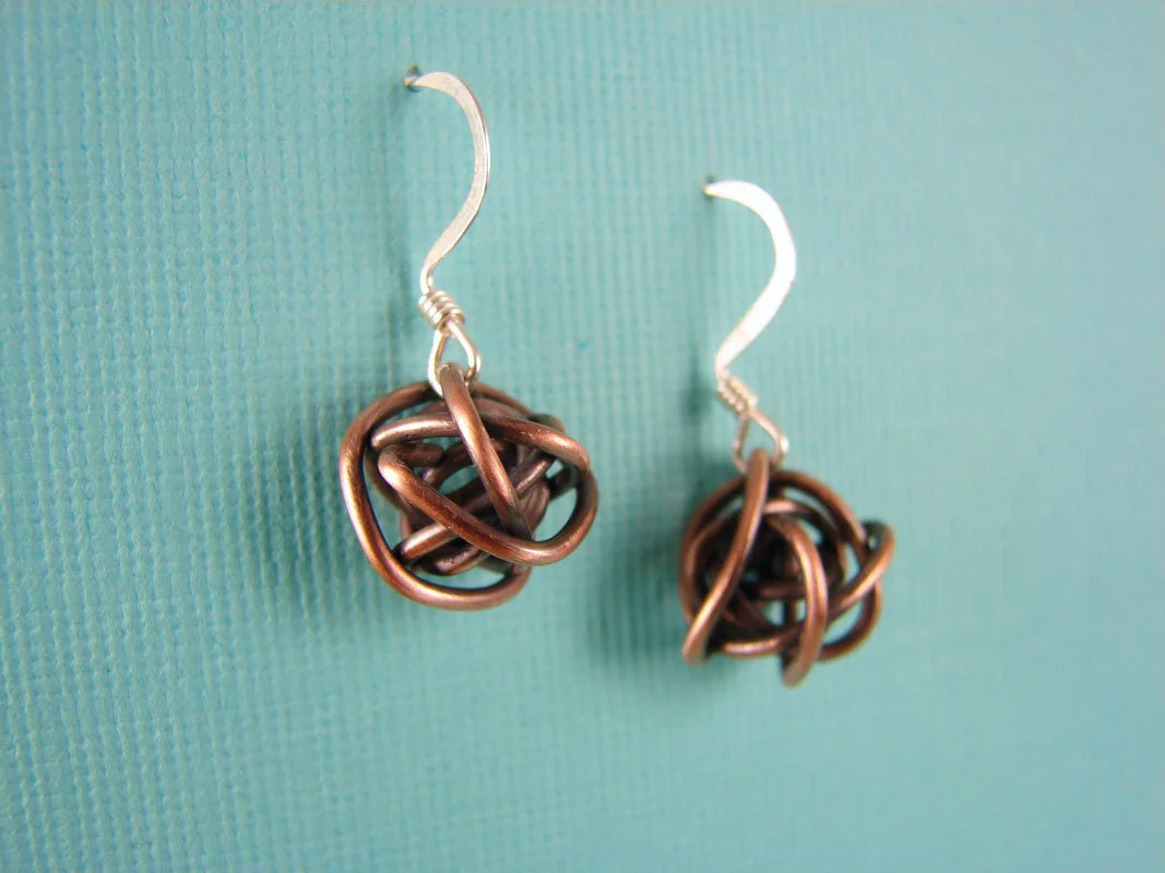 Antiqued copper wrapped wire ball earrings on sterling silver earwires