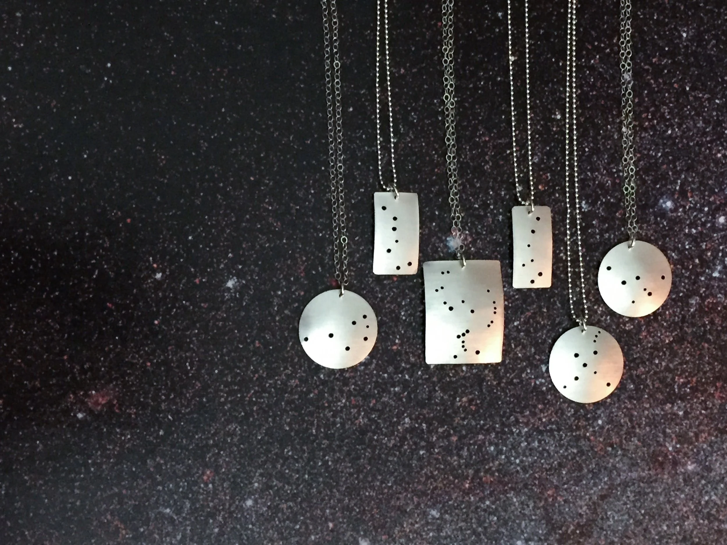 collection of constellation necklaces