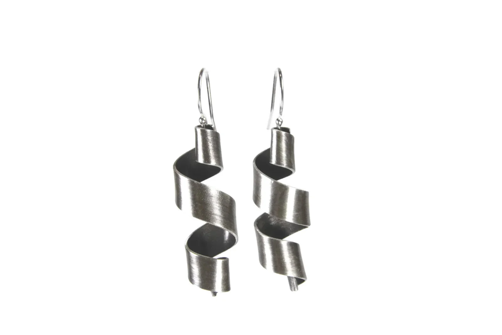 Earrings are a strip of antiqued silver twisted into a corkscrew curl shape. The silver is darkened to grayish-black with hints of silver showing through a brushed finish. Large curl size shown.