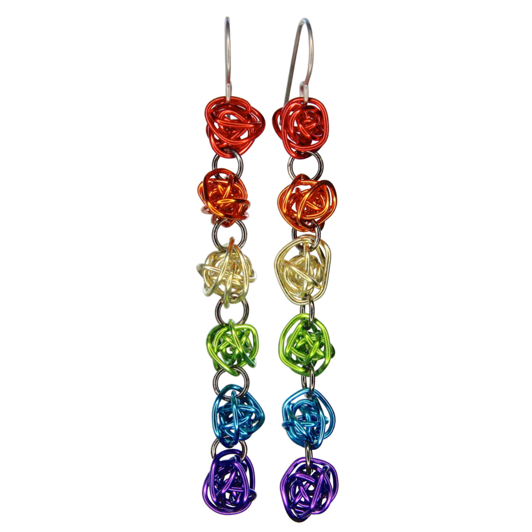 Each earring has 6 colorful loosely wrapped wire balls attached vertically by jump rings in the order of the rainbow - red on top, then orange, yellow, green, blue, and purple.