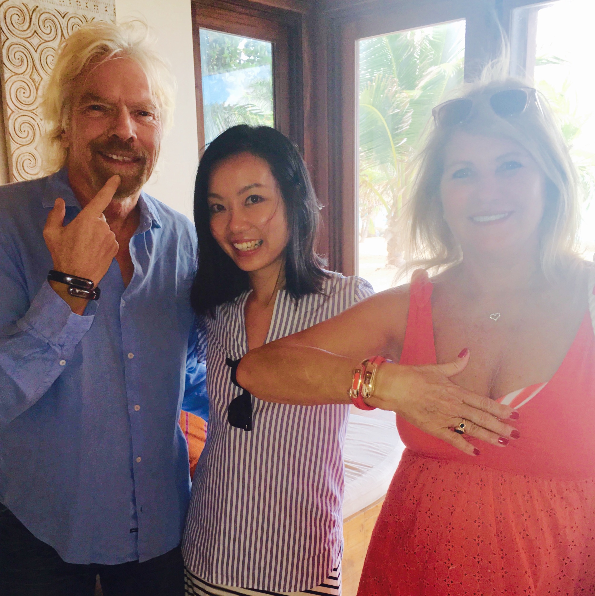 Sir Richard Branson and His Wife Joan Experiencing the Helix Cuff with Angela Pan