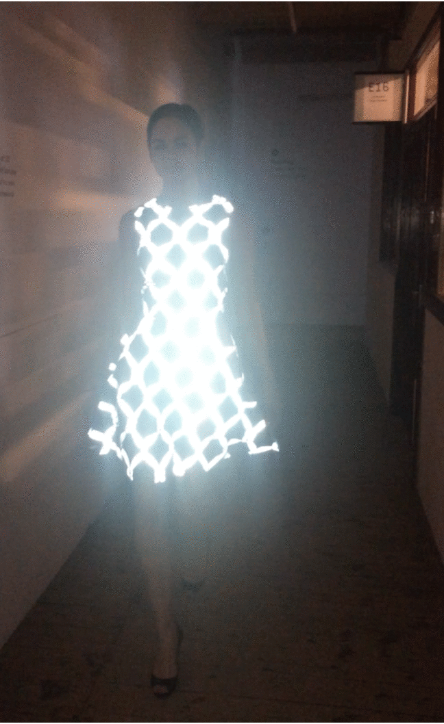 Laura Theiss is at the forefront of fashion technology by printing light reflective foil onto her designs. 