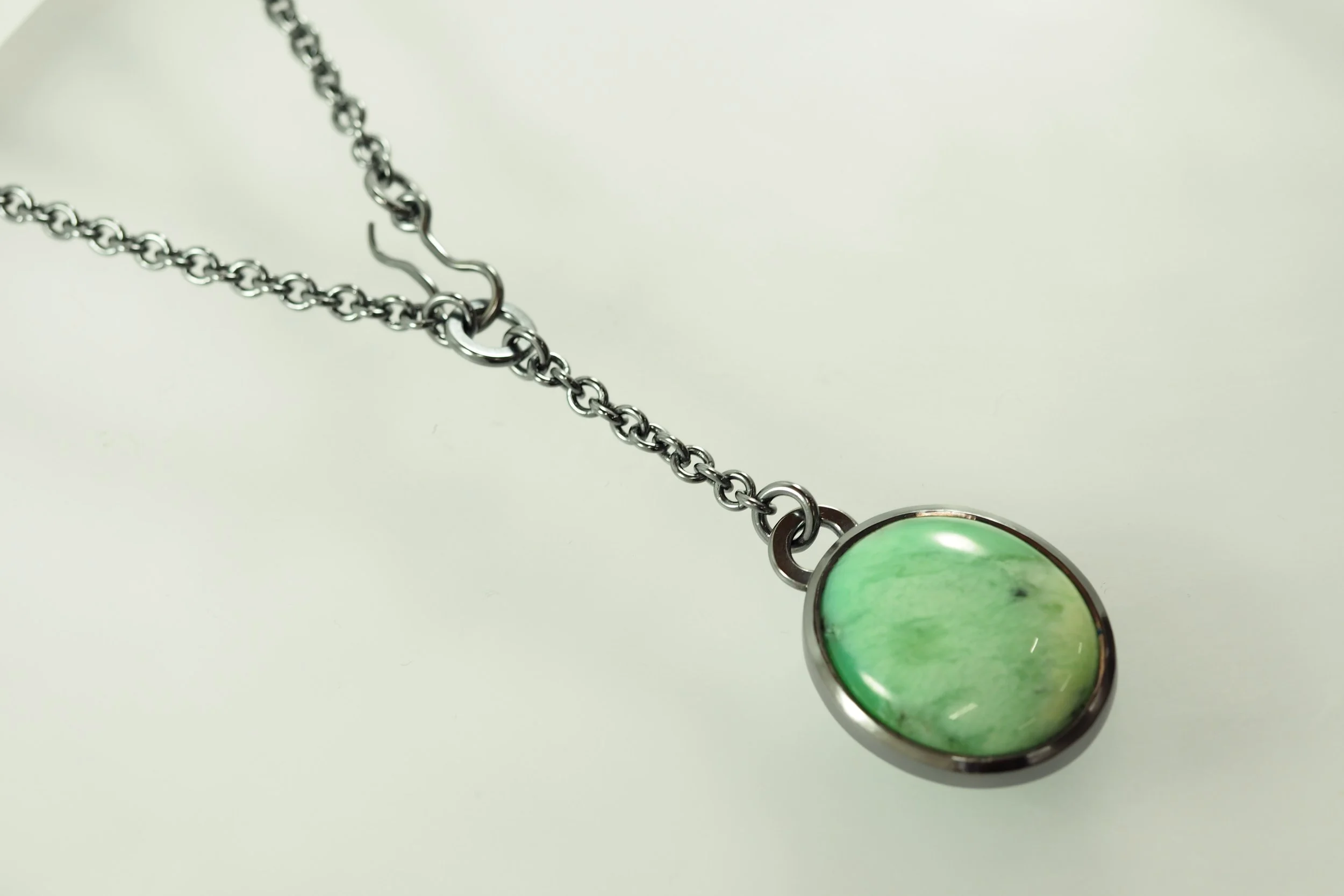 Created in association with the South Australian Museum. Oxidized Sterling Silver and Fine Silver with Chrysoprase. 