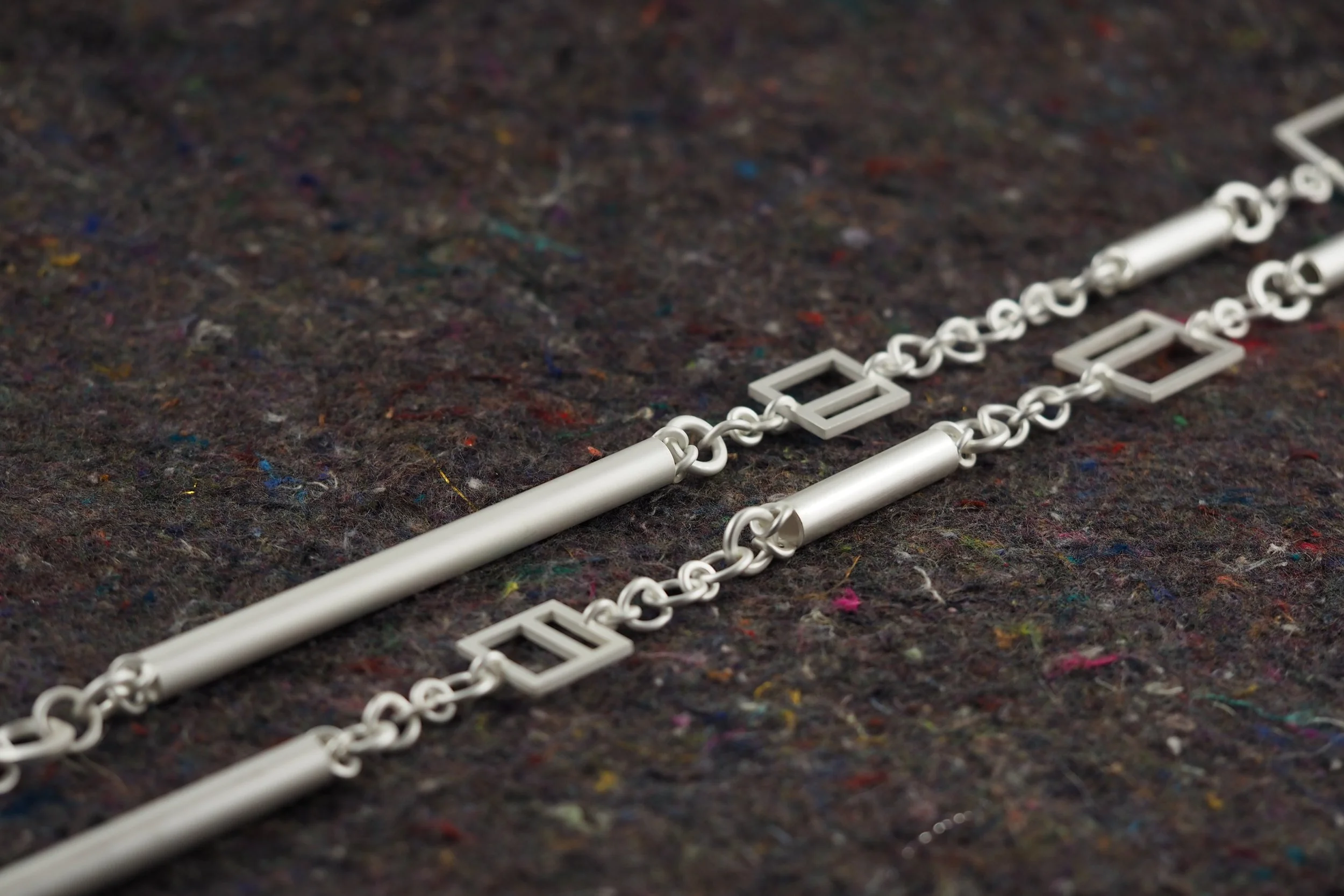 Tubular and Window Necklace, Oxidized sterling silver.
