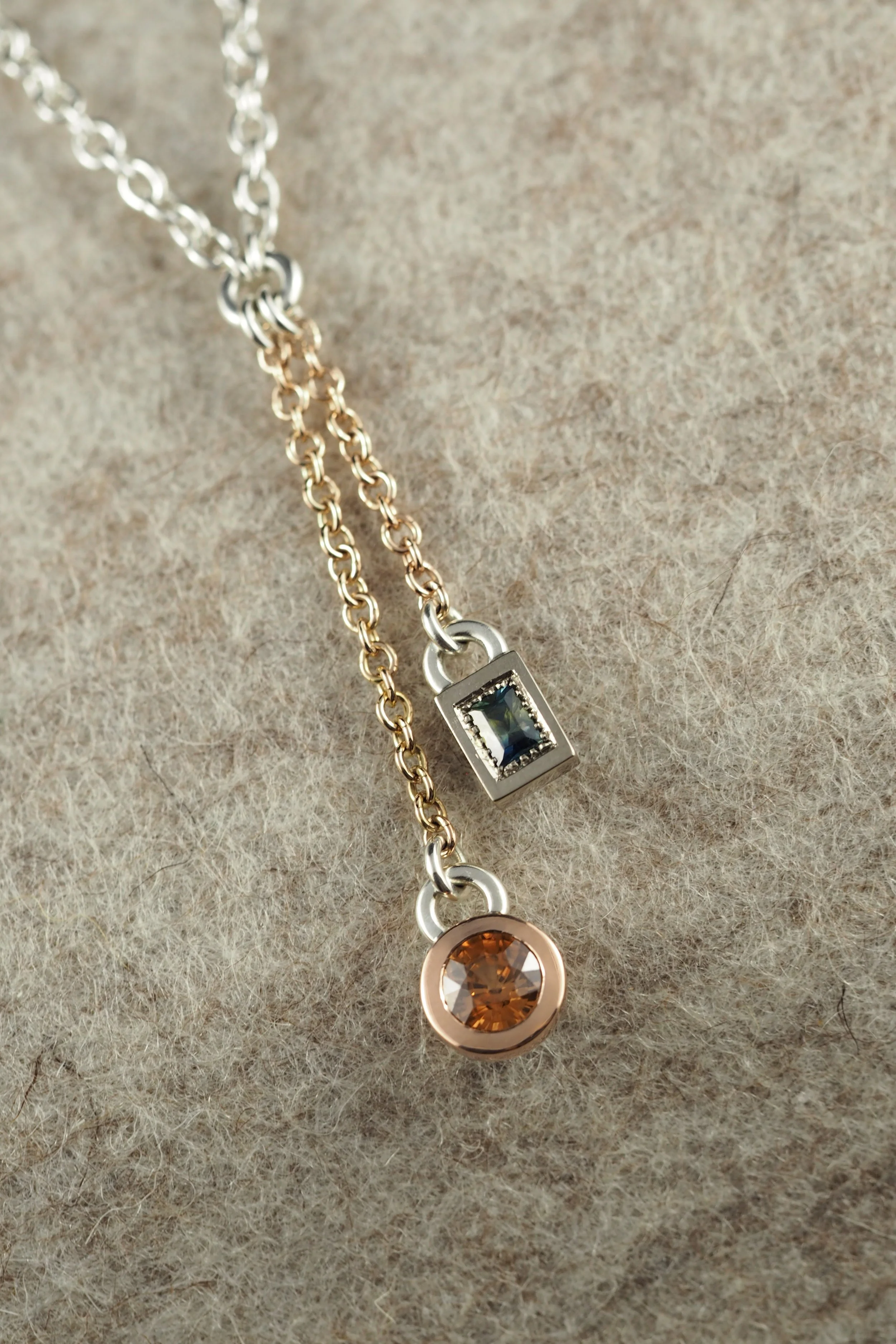 Tag me Neckpiece, 9ct Yellow, White and pink Gold, Sterling Silver with An Australian Zircon and a Madagascan Sapphire. 