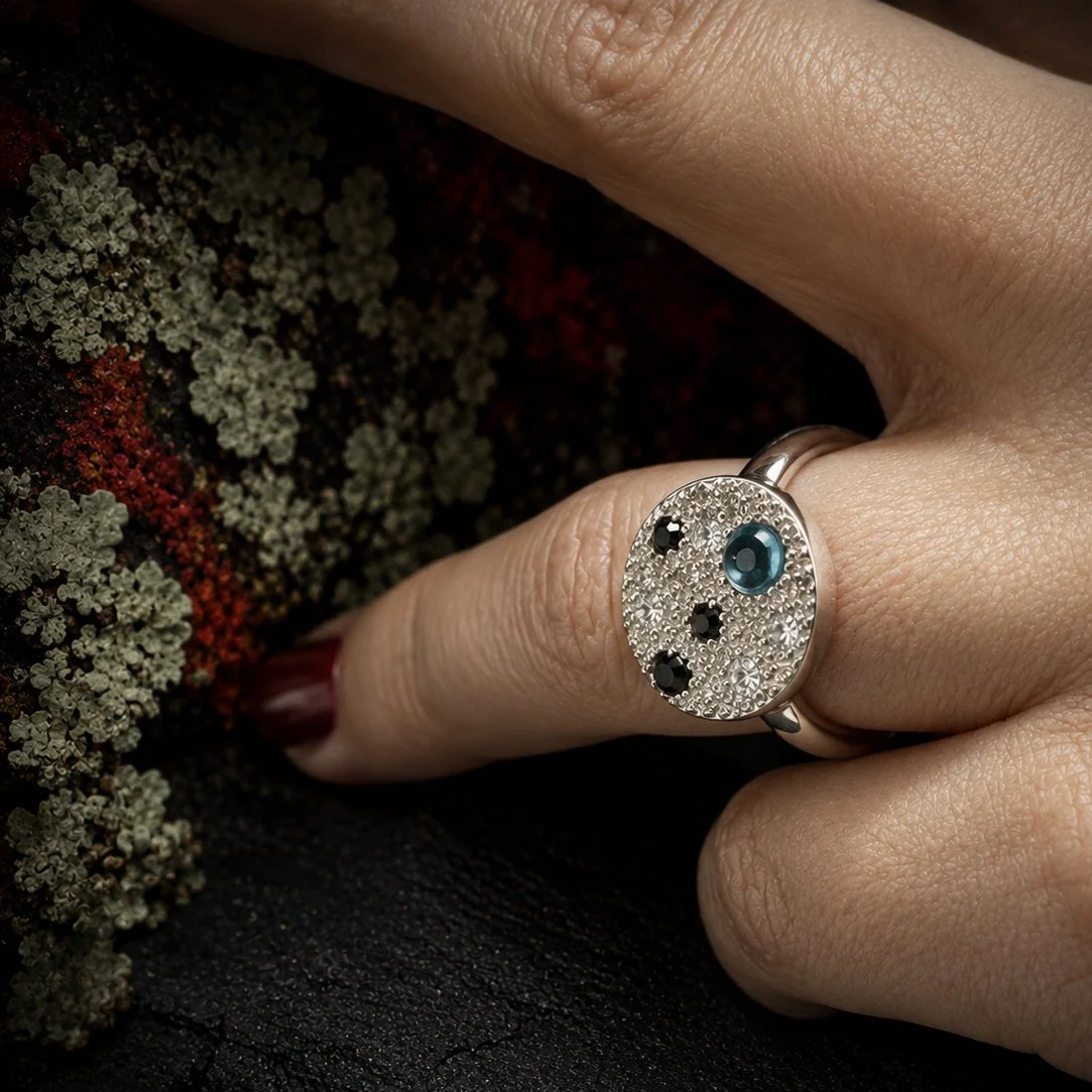 Enchanted Lichen Ring worn on the hand, showing the scale of the sculptural silver ring