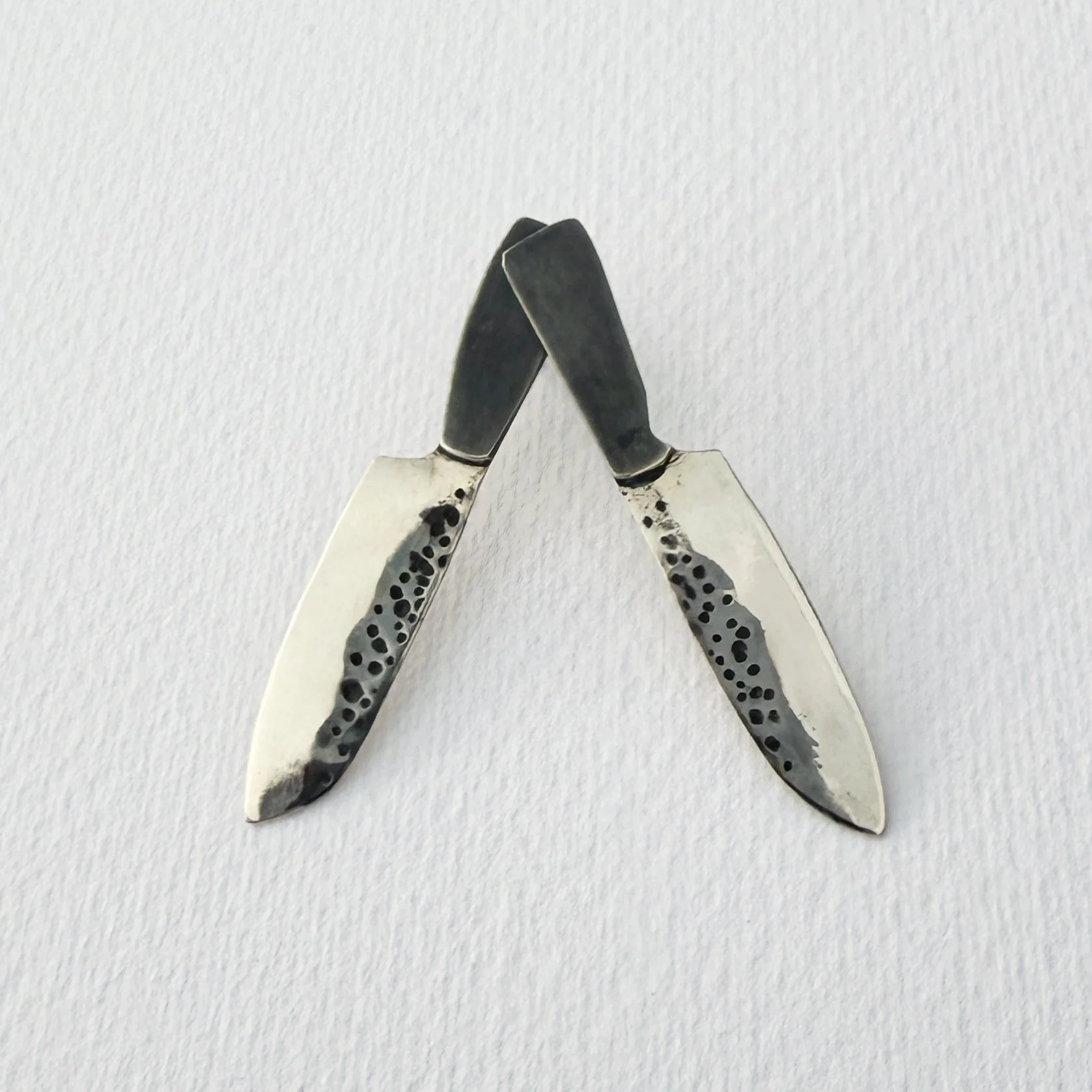 on paper crossed.jpg