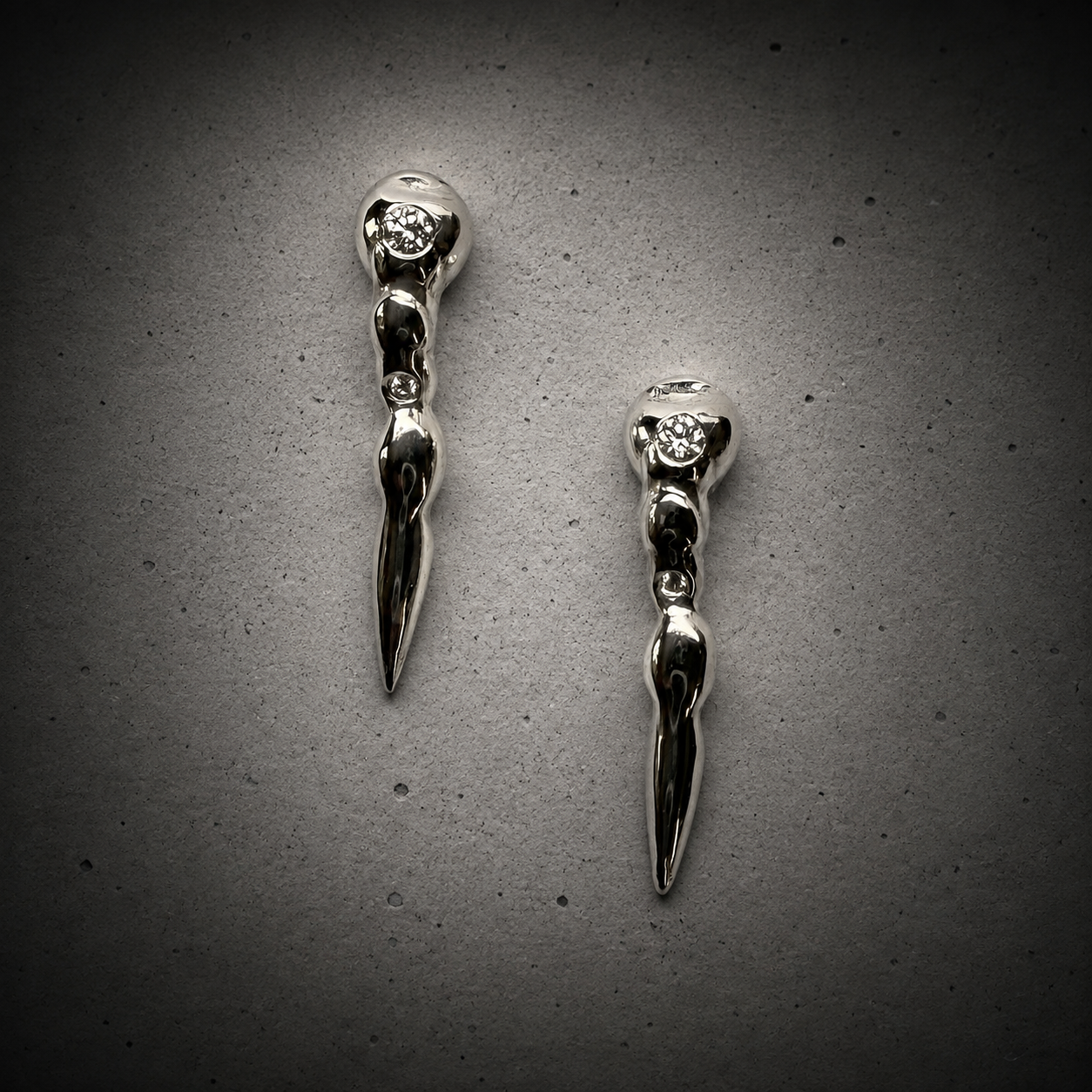 Organic curved diamond earrings