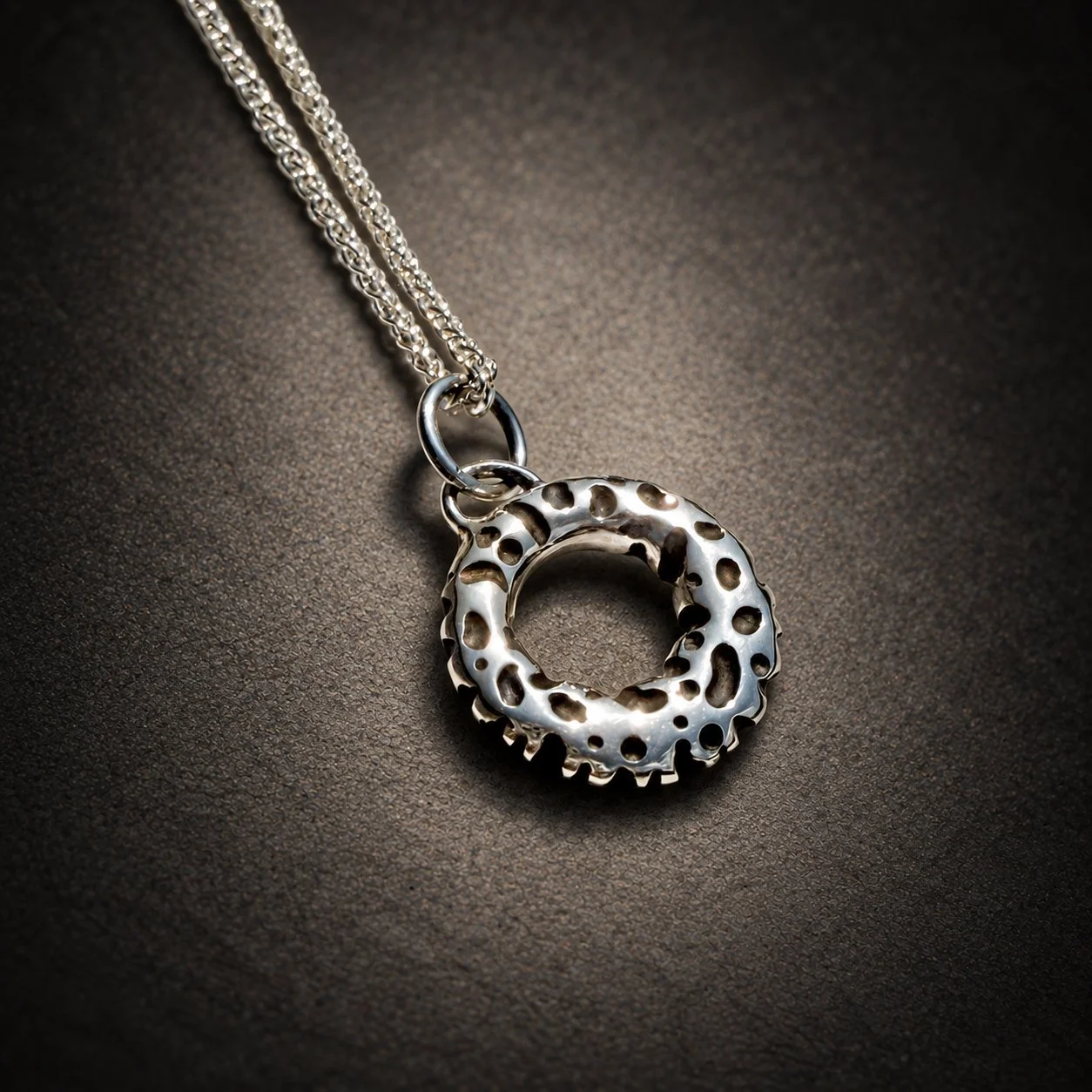 Leopard lichen silver pendant with oxidised spots