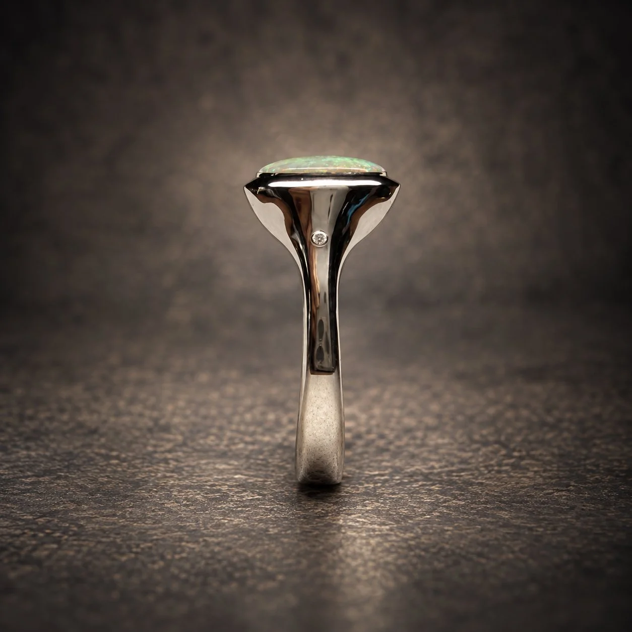 Amaranth opal and diamond silver ring – handmade in Lyme Regis, Devon, profile view