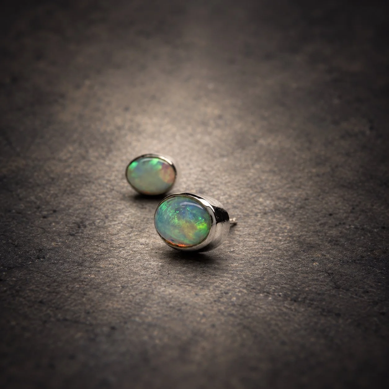 Natural opal silver stud earrings, oval in shape