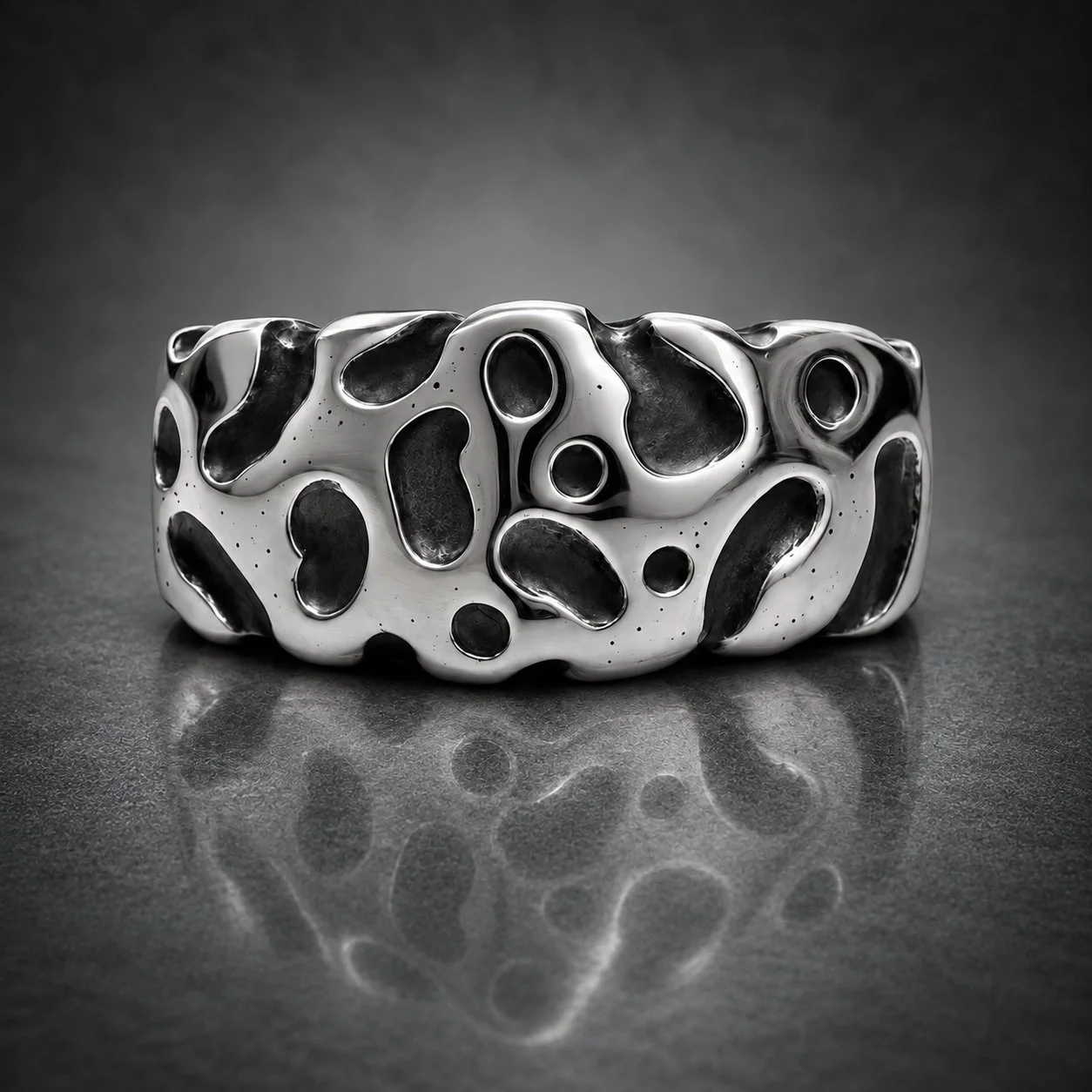 Leopard lichen ring silver with oxidised black spots close up view