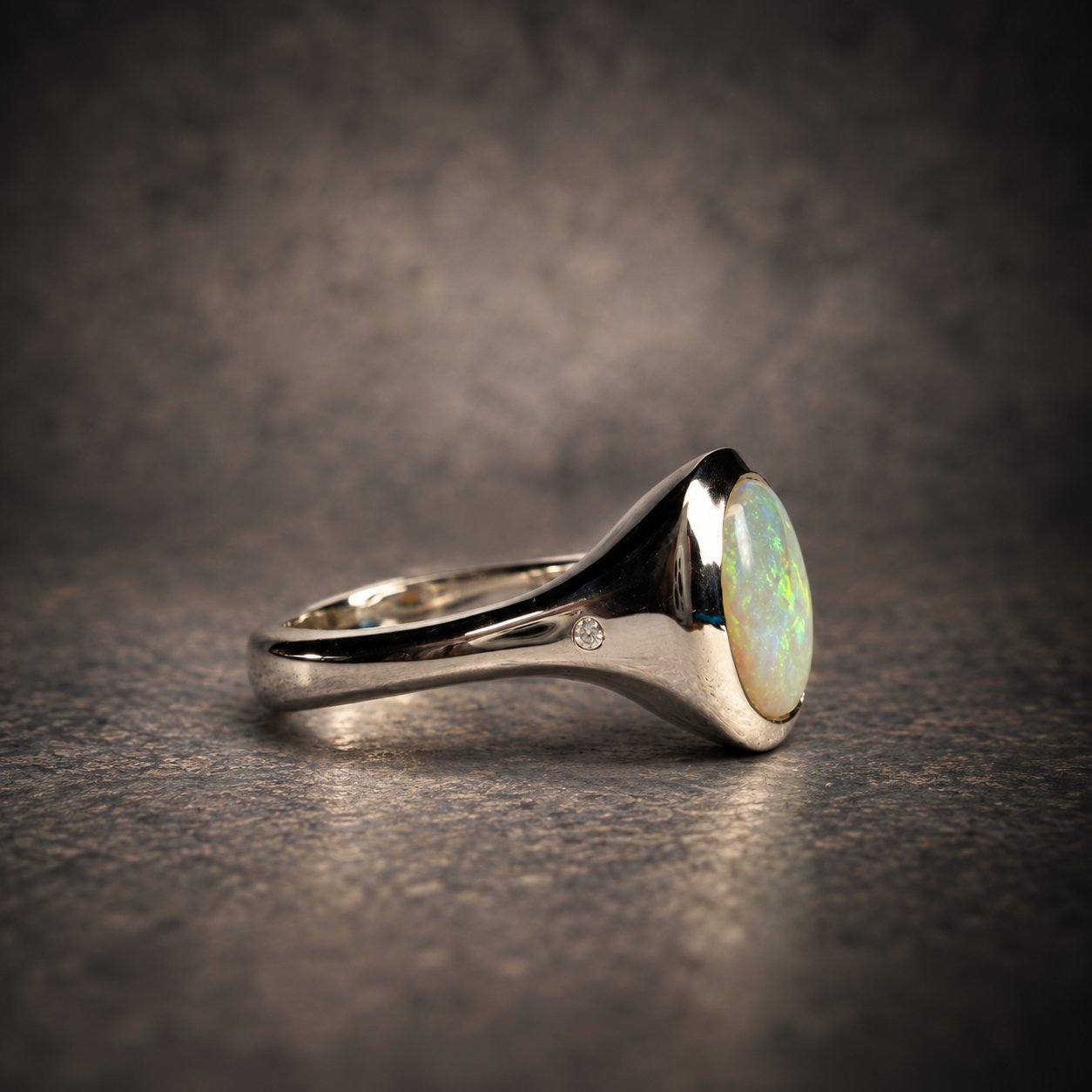 Amaranth opal and diamond silver ring – handmade in Lyme Regis, Devon, side view