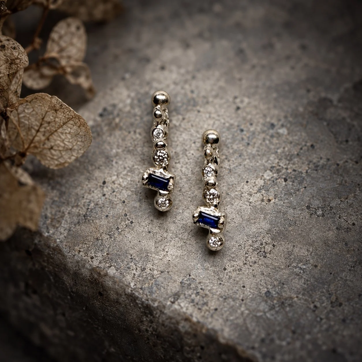 Fragments handmade sterling silver gemstone stud earrings with blue baguette sapphires and lab-grown diamonds