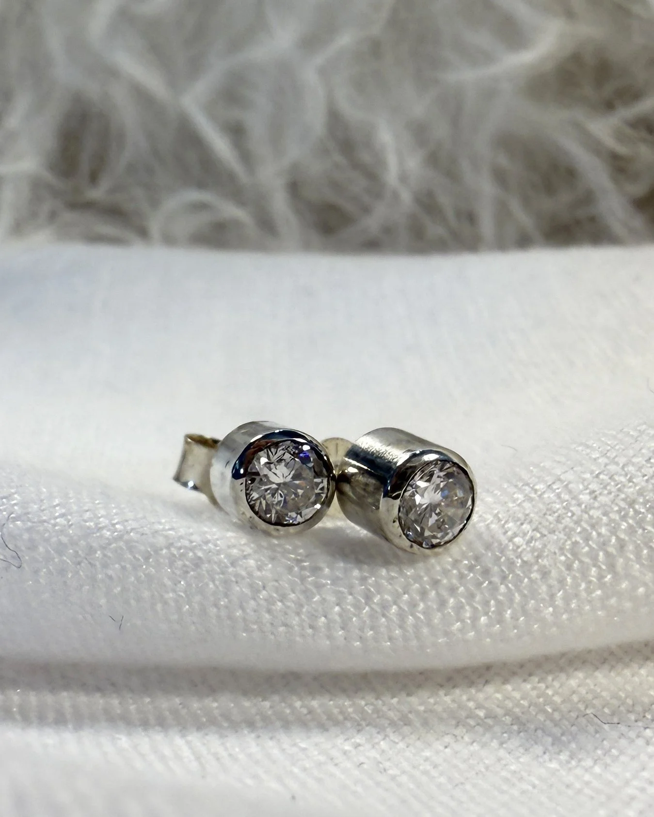 Silver studs with brilliant white sparkle