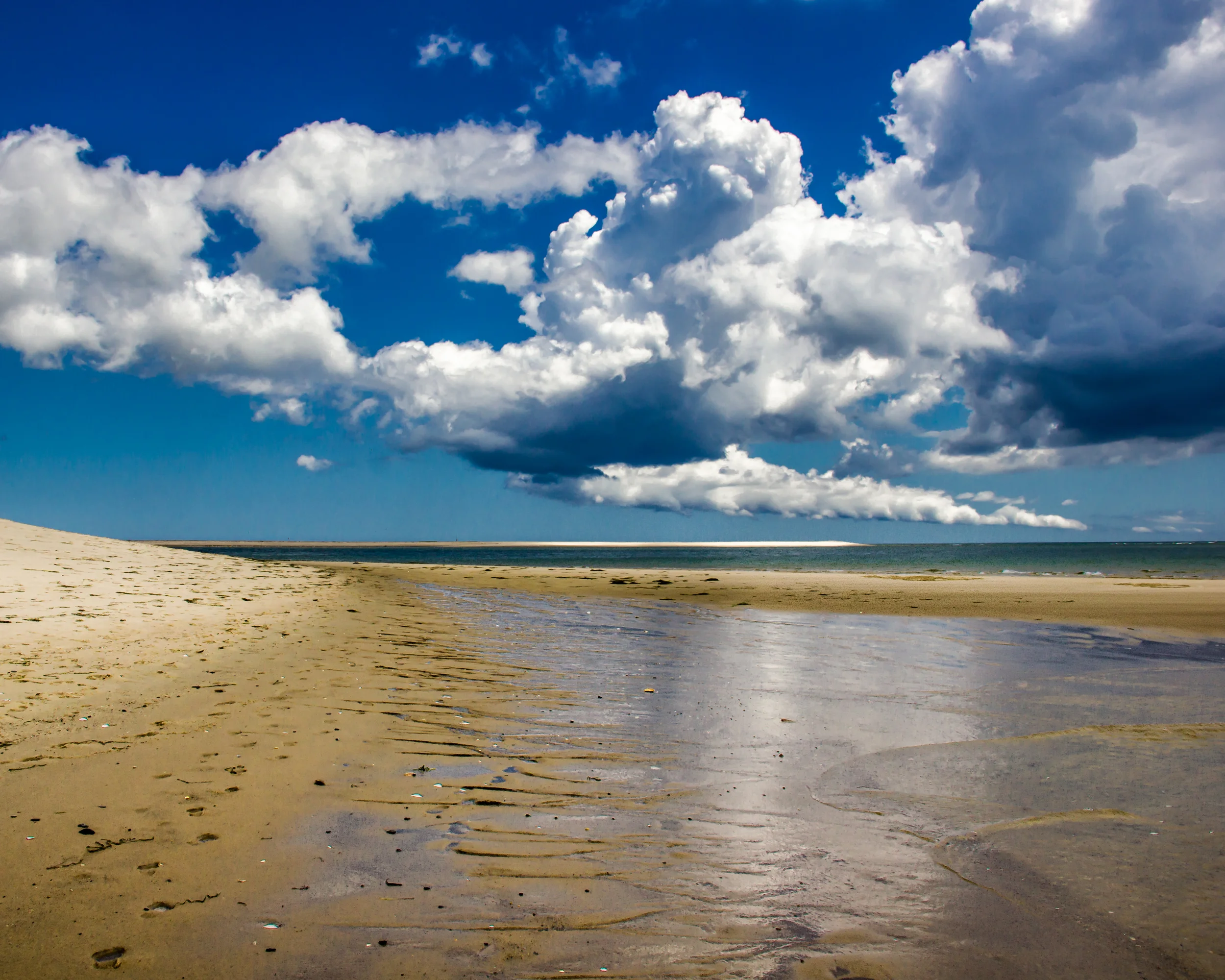 Lighthouse beach clouds.jpg