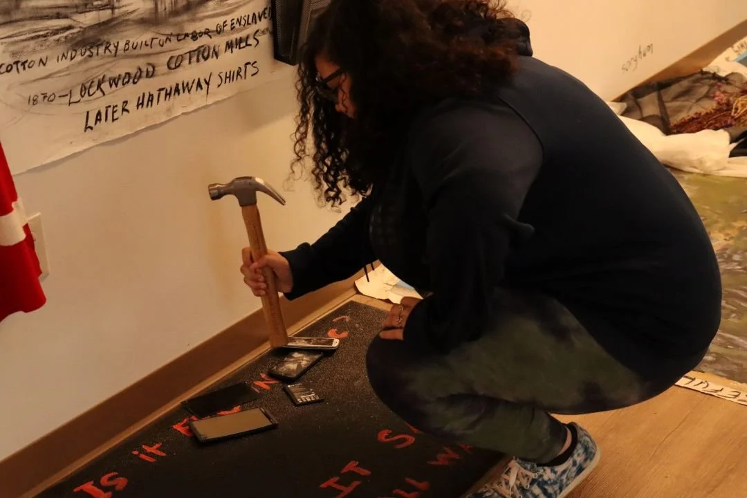 sm Student smashes phones, Where We Are Now installation.JPG
