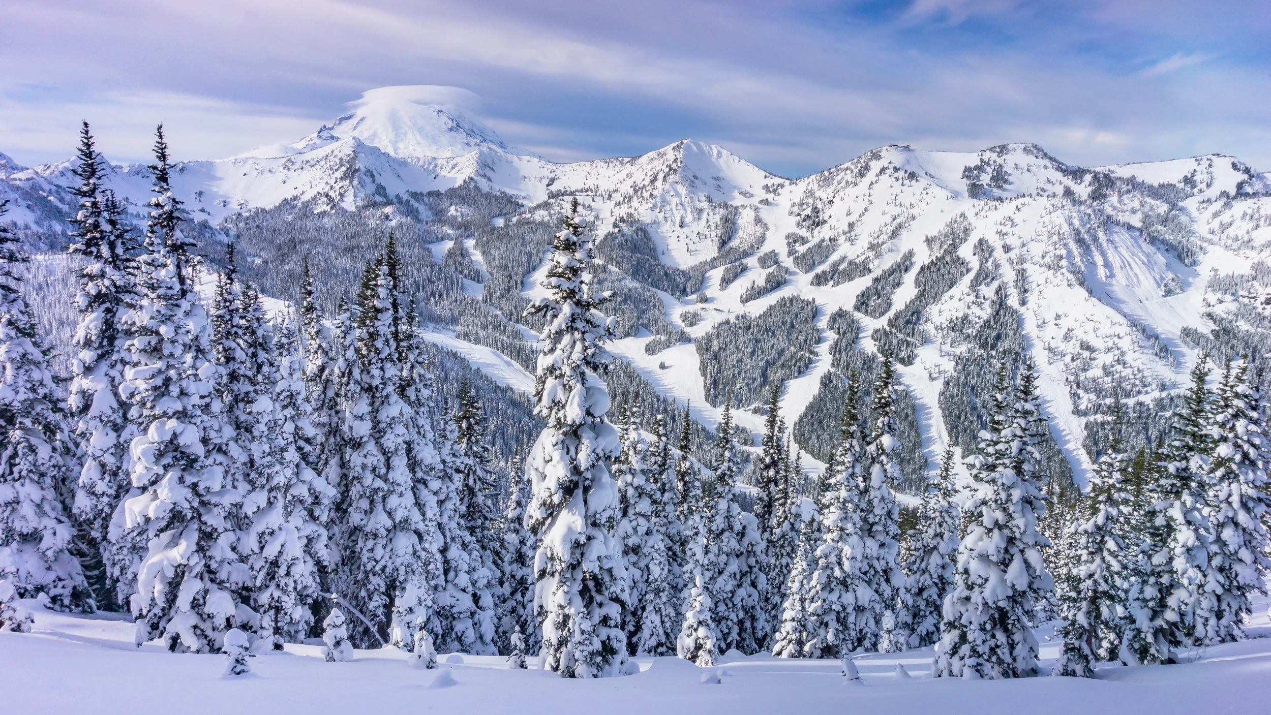 Mount Rainier peeking over the Crystal Mountain Ski Resort.