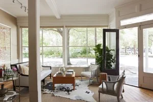 Cowhide+Rug+hide+layered+atop+sisal+rug+sitting+58rv2YaLBQFl
