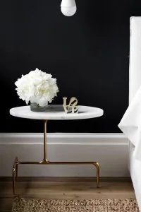 21 - black walls, marble and gold table