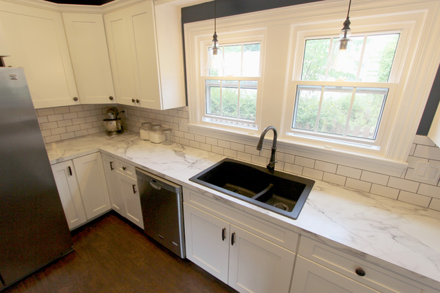 This is a faux marble laminate counter with a drop in sink!