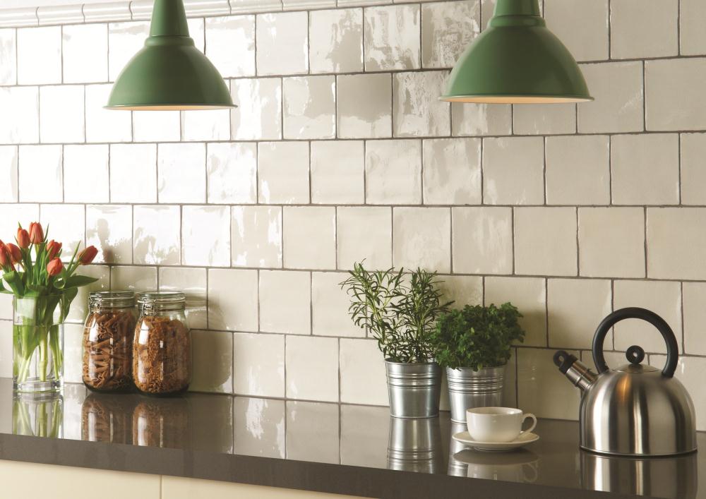 While I don't believe the subway tile is ever really gone, do now consider a square tile as the 'go-to' inexpensive option. This is a more expensive handmade version.