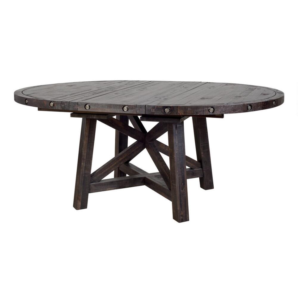  Urban Barn has a few extension tables, but this round Ironside one caught my eye with its rugged finish and large size. It's 54" round, with an 18" leaf. 